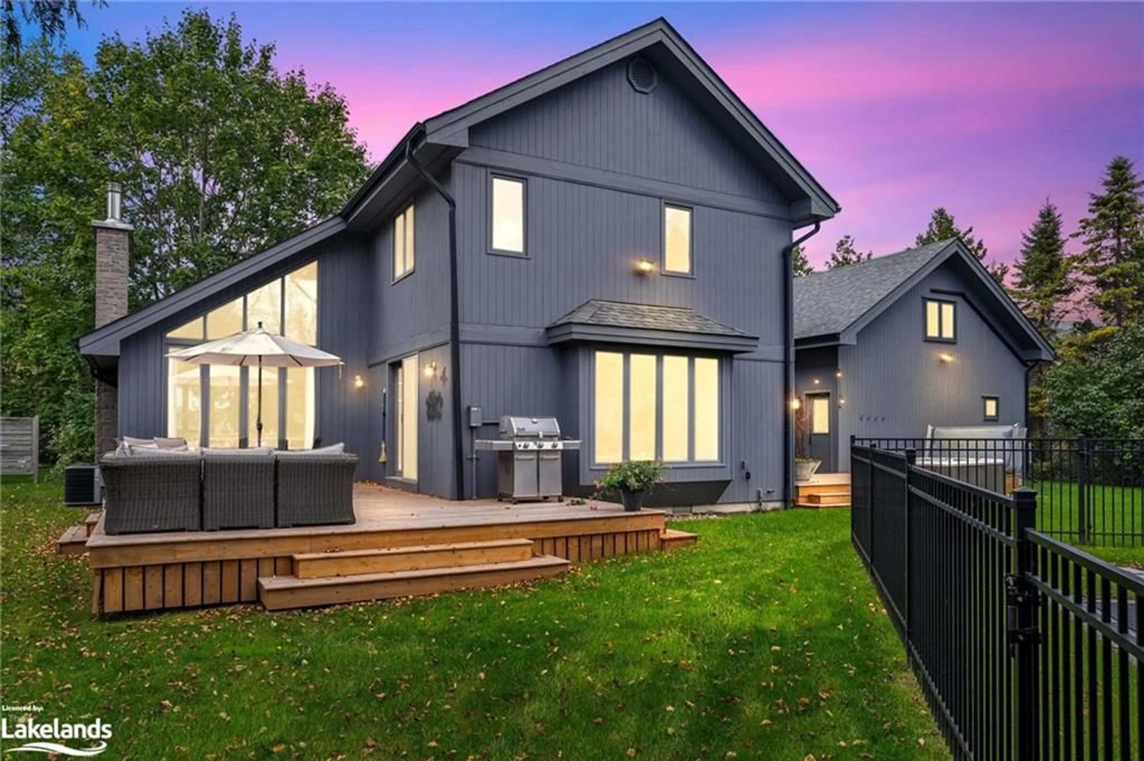 Frontside or backside of a home, the fenced backyard for 11 Woodview Dr, Clearview Ontario L9Y 3Y9