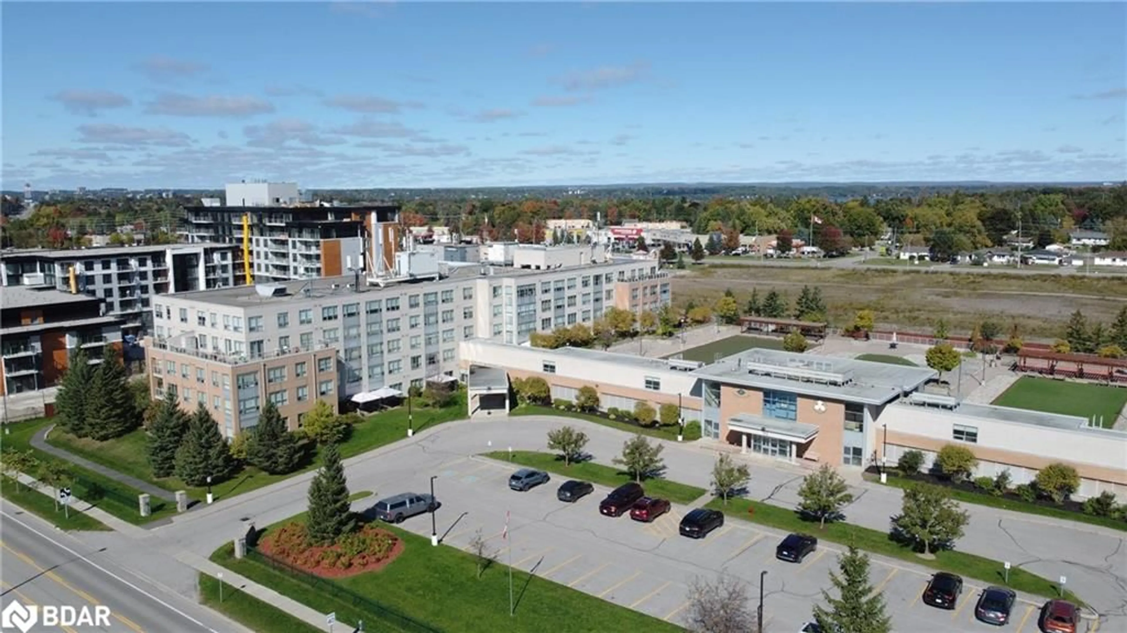 A pic from exterior of the house or condo, the view of city buildings for 90 Dean Ave #412, Barrie Ontario L4N 0M3