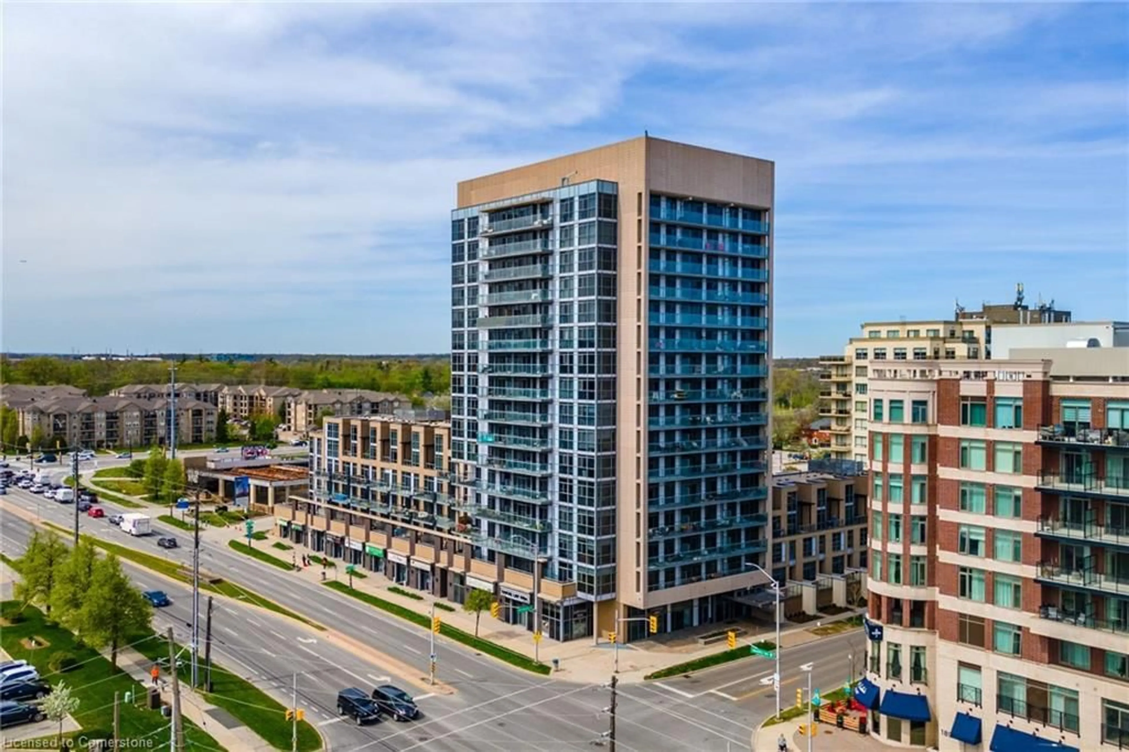 A pic from exterior of the house or condo, the front or back of building for 1940 Ironstone Dr #404, Burlington Ontario L7L 0E4