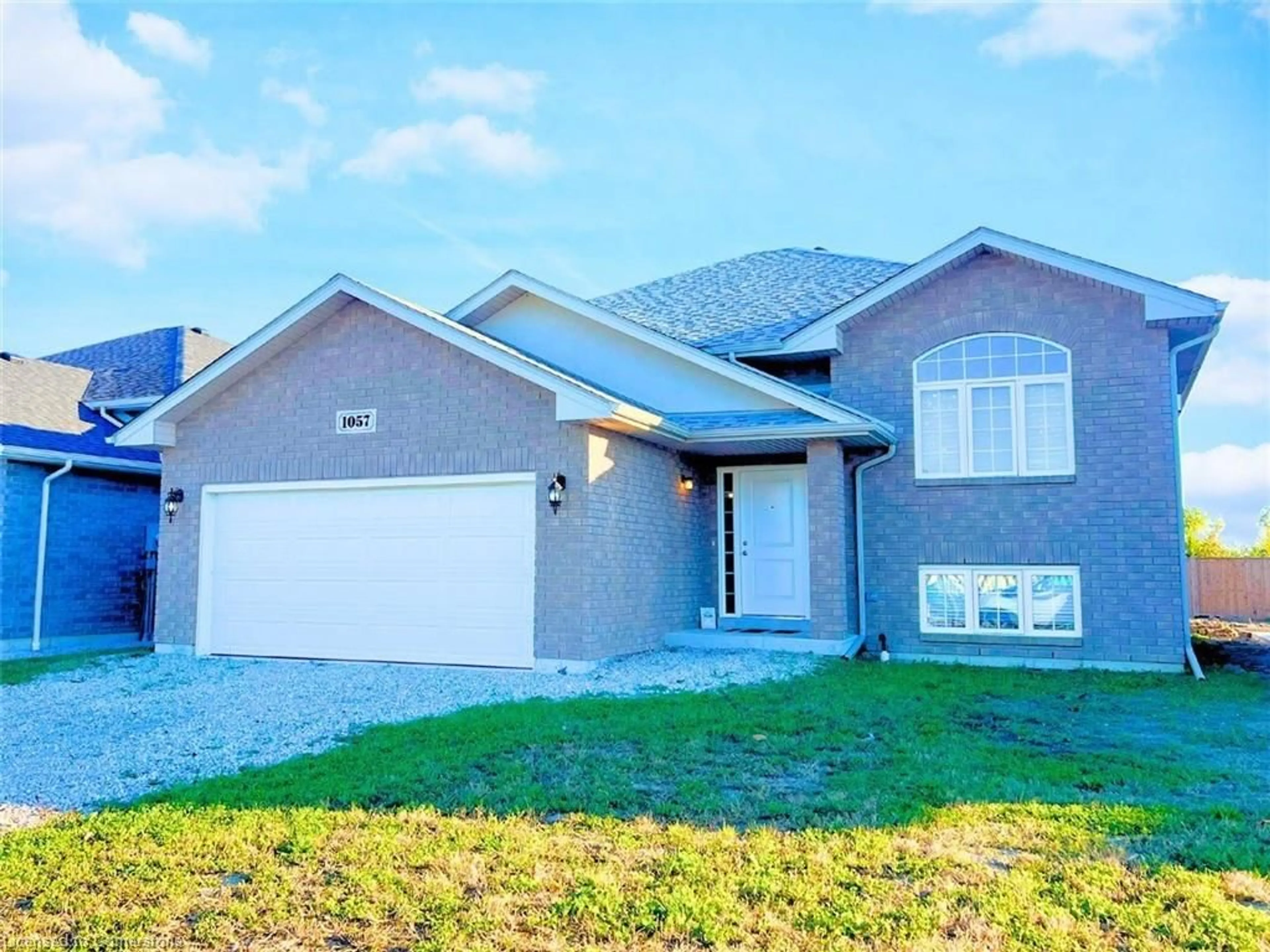 Frontside or backside of a home, the street view for 1057 Aspen Ridge Cres, Belle River Ontario N0R 1A0