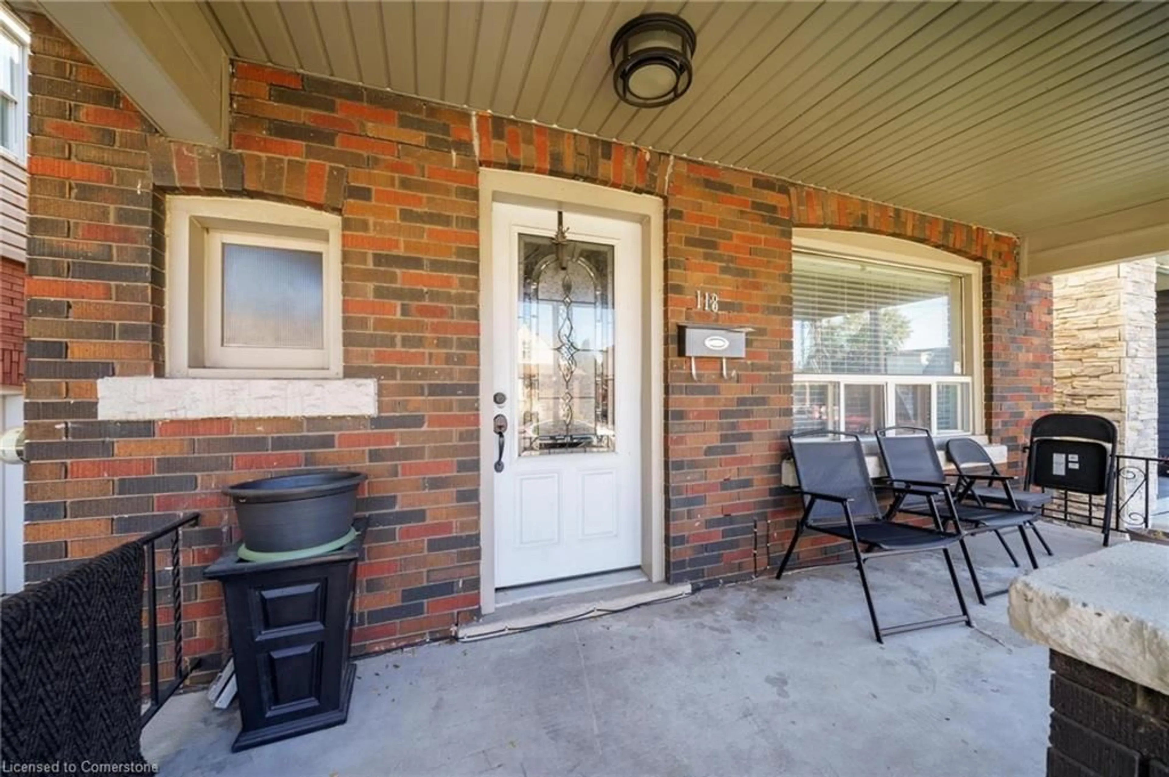 Indoor entryway, wood floors for 118 Barons Ave, Hamilton Ontario L8H 5A7