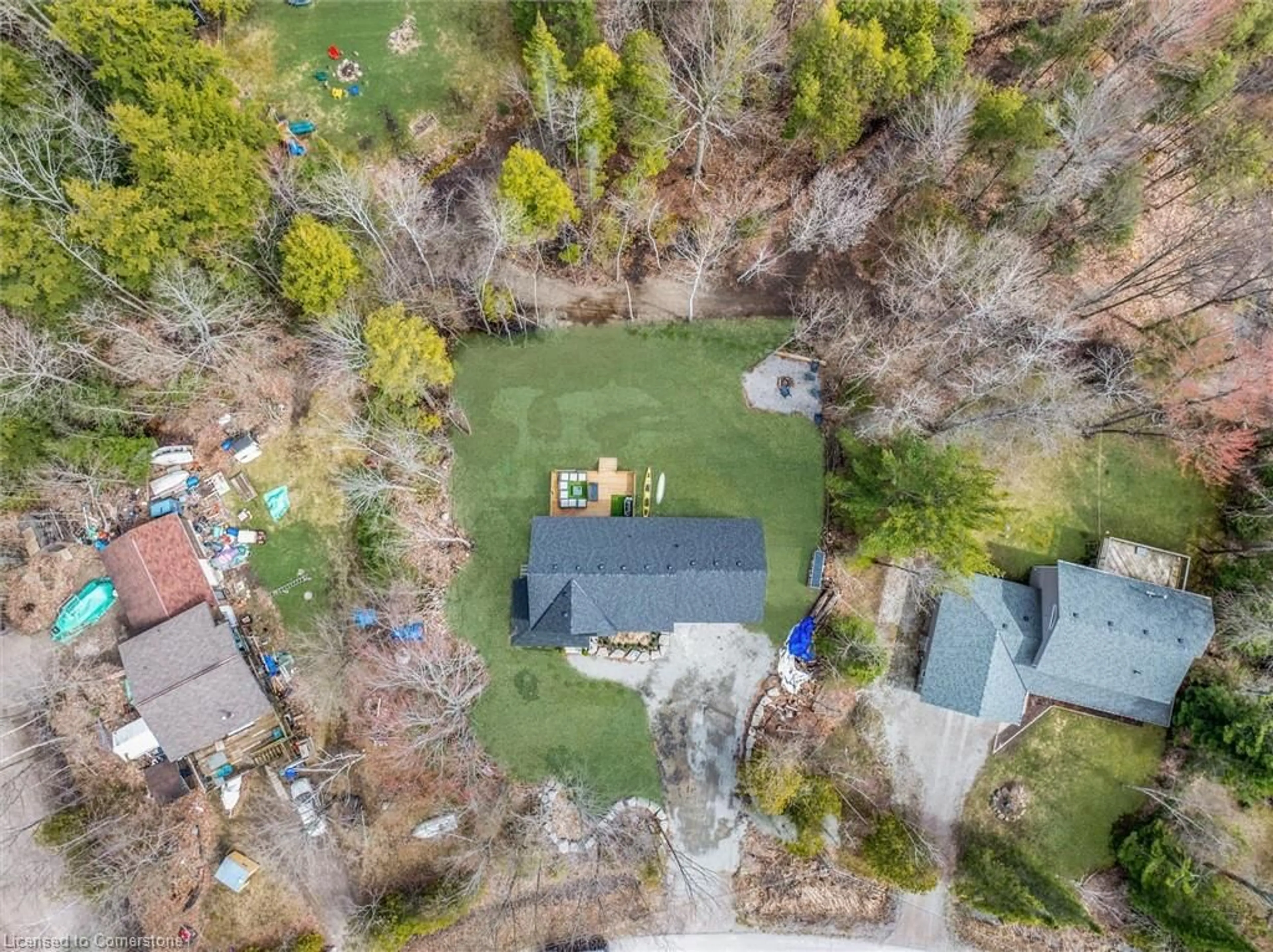 Frontside or backside of a home, the fenced backyard for 11 Joliet Cres, Tiny Ontario L9M 0G3