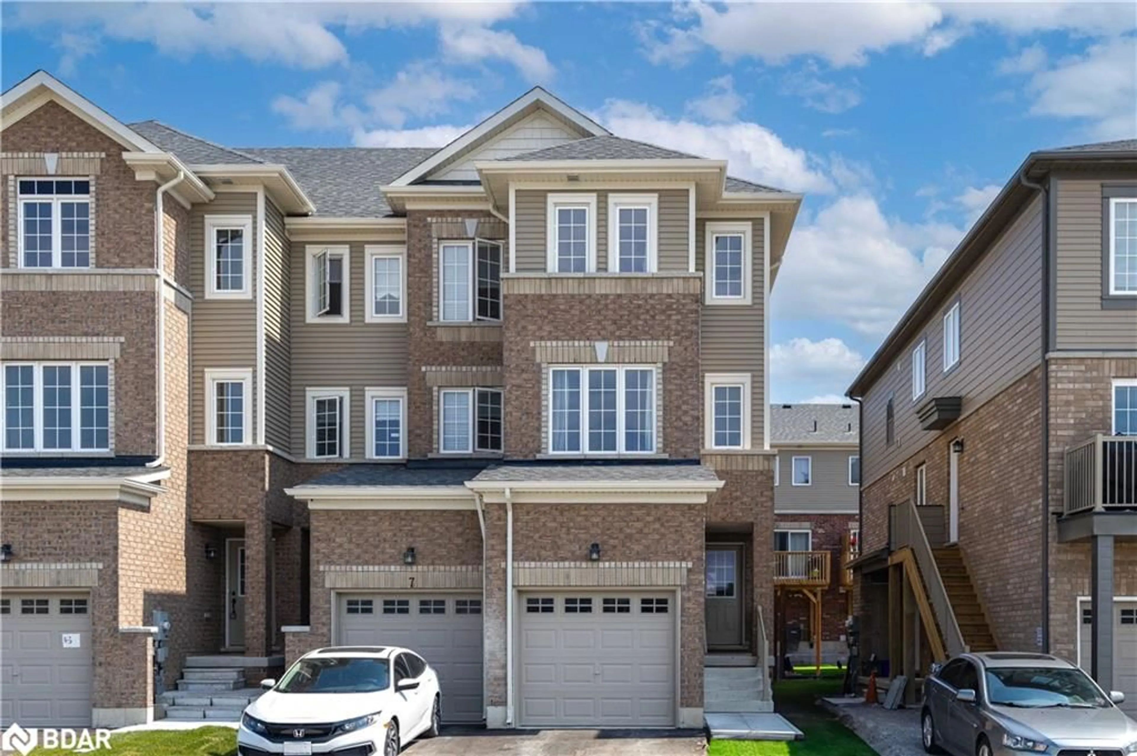 A pic from exterior of the house or condo, the street view for 9 Tobias Lane, Barrie Ontario L9J 0T8