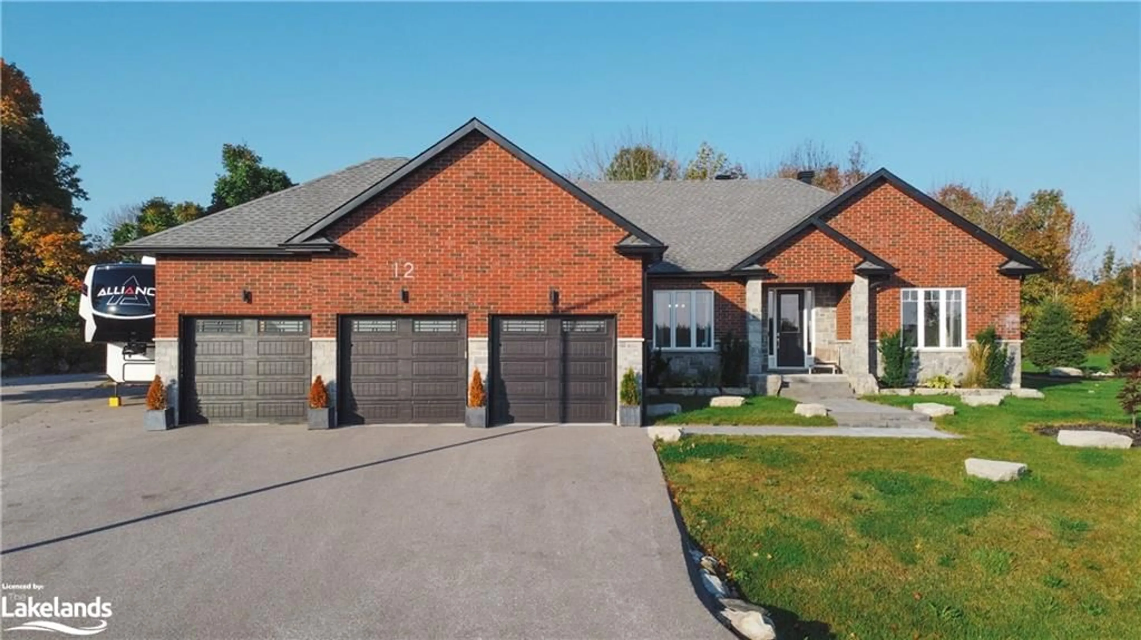 Home with brick exterior material for 12 Reids Ridge, Moonstone Ontario L0K 1N0