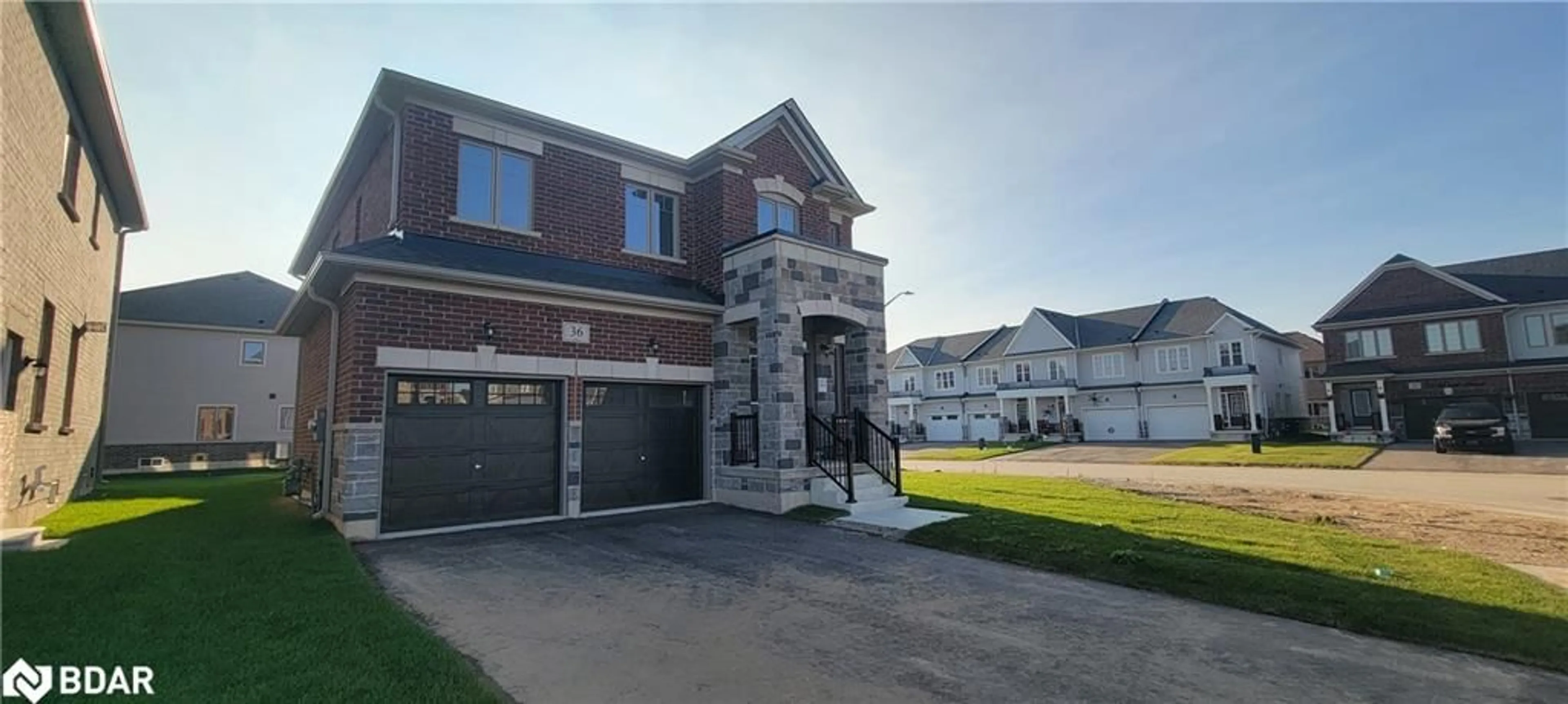 Frontside or backside of a home, the street view for 36 Doc Lougheed Avenue, Southgate Ontario N0C 1B0