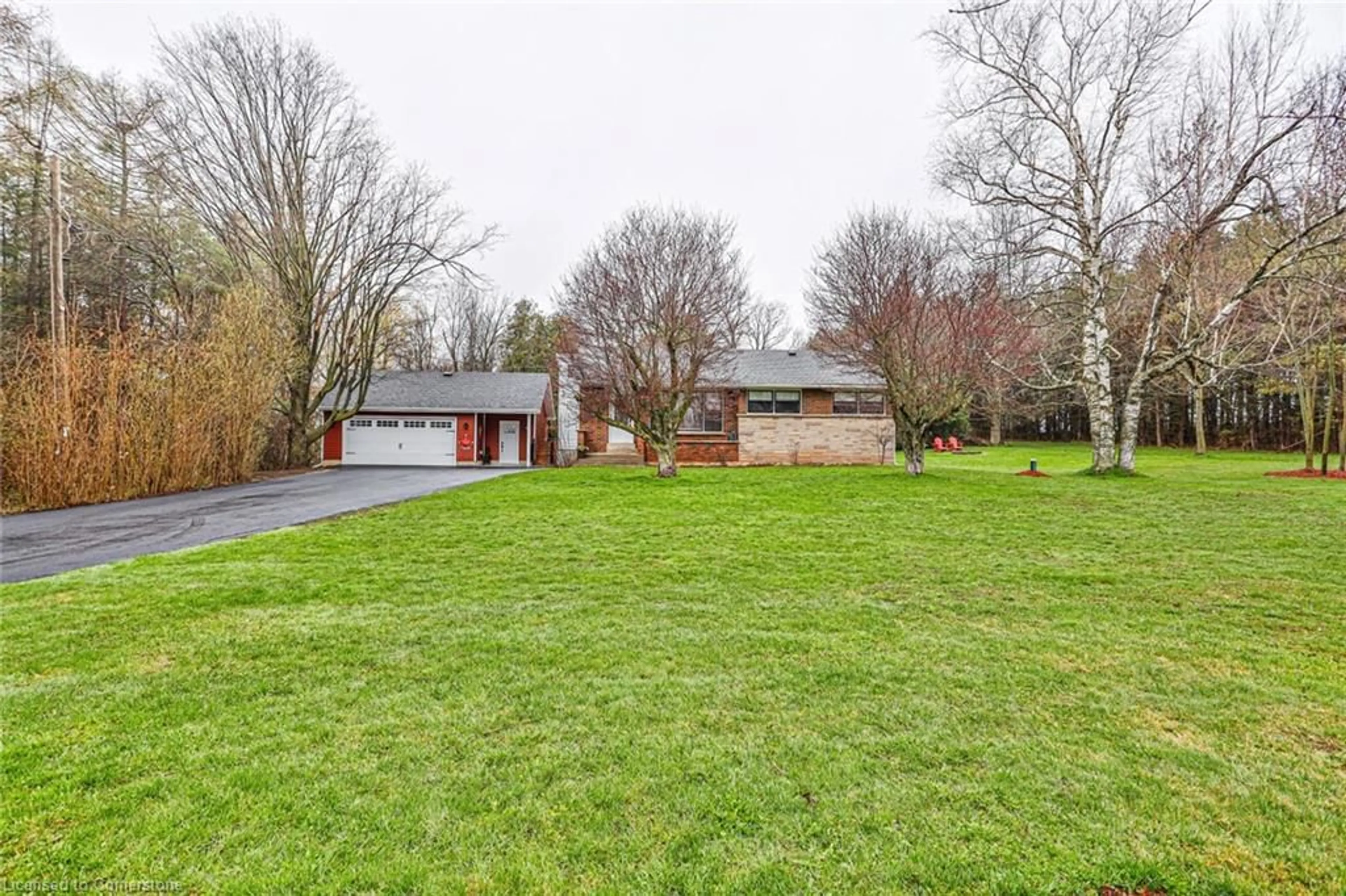 Frontside or backside of a home, the fenced backyard for 511 Campbellville Rd, Hamilton Ontario L0P 1B0