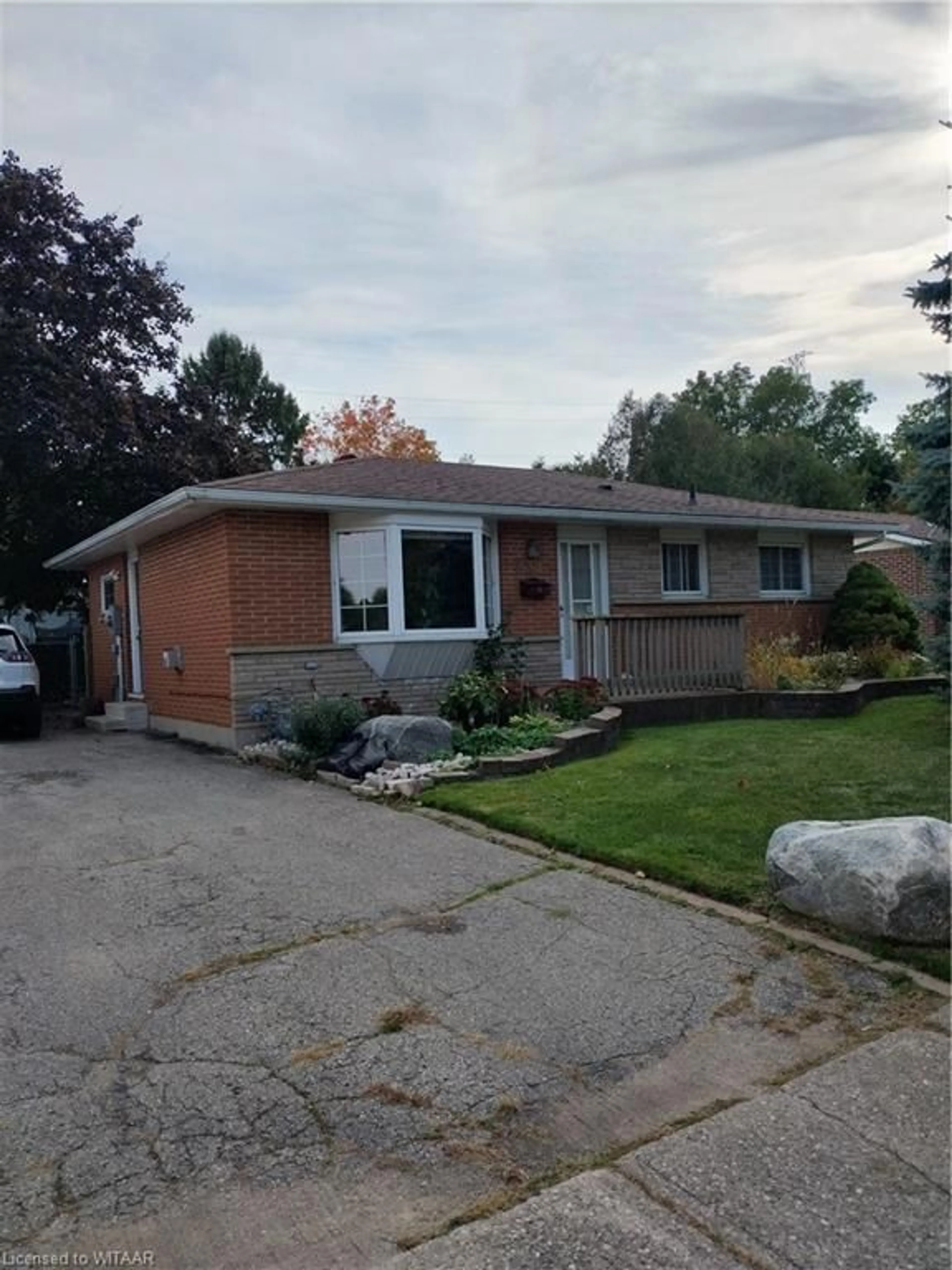 Frontside or backside of a home, the street view for 834 Frizelle Dr, Woodstock Ontario N4S 2M9