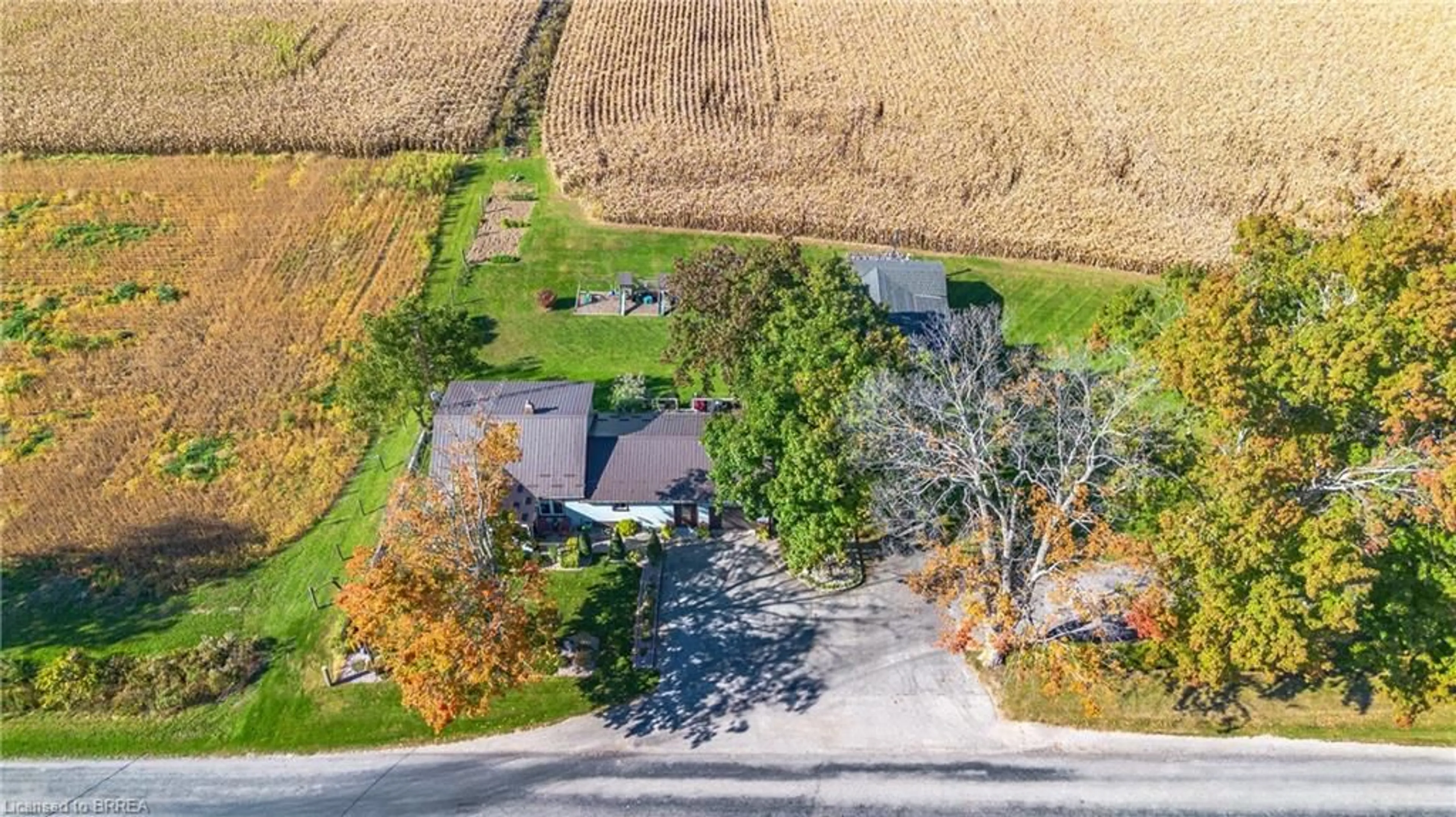 A pic from exterior of the house or condo, the fenced backyard for 1331 Concession 12 Rd, Langton Ontario N0E 1G0