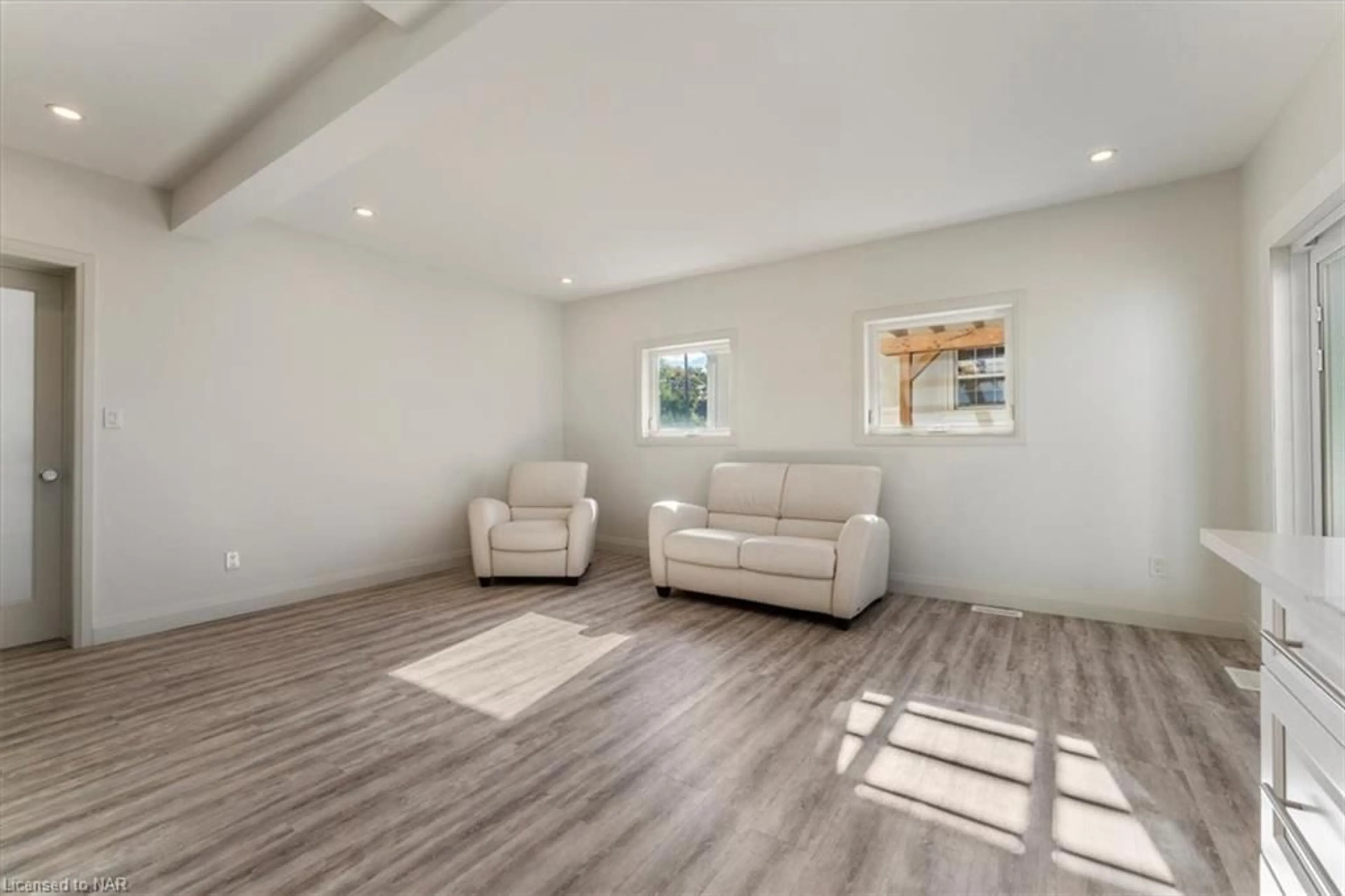 A pic of a room, wood floors for 13 Ambrose St, St. Catharines Ontario L2S 2K6