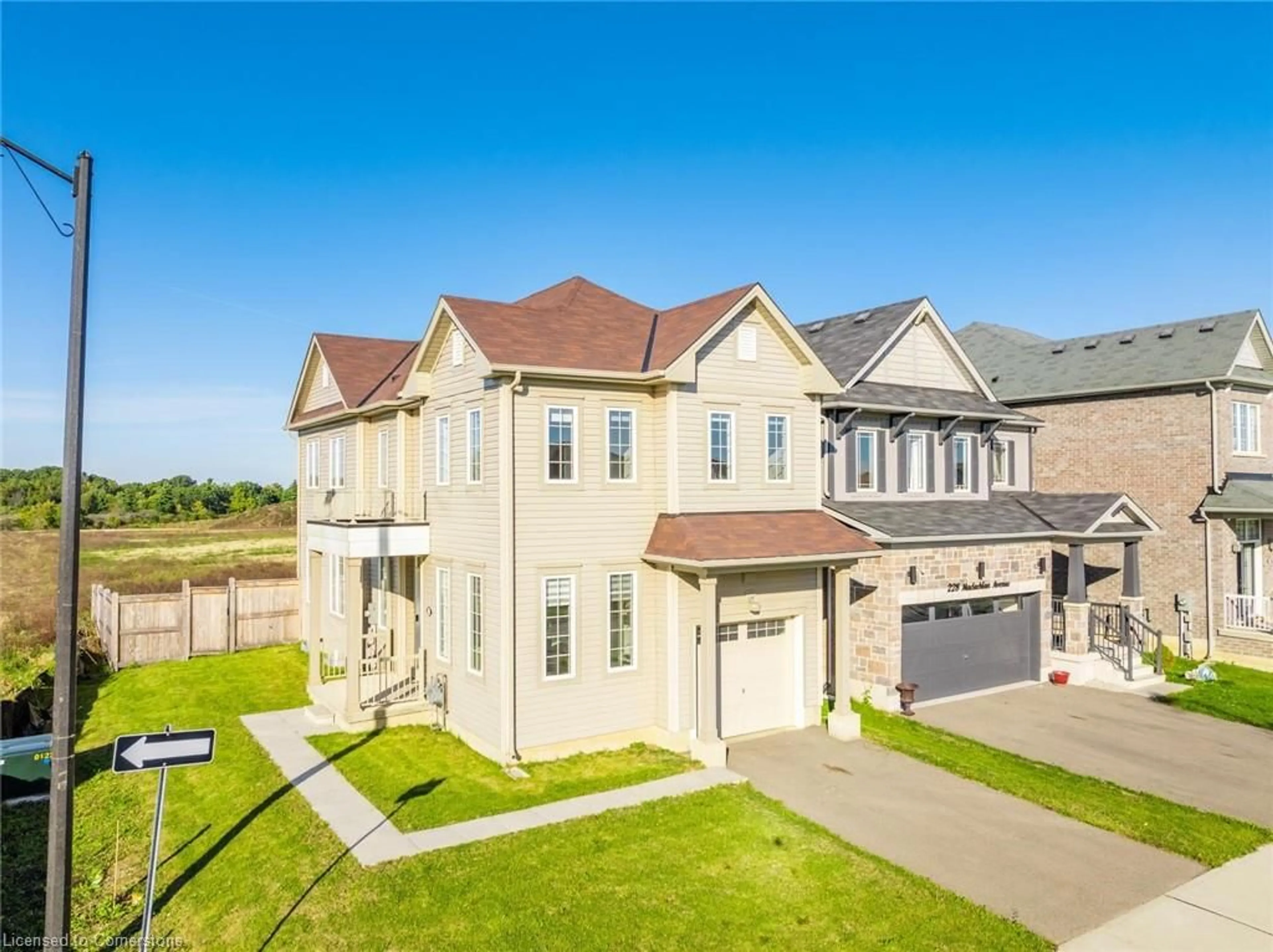 Frontside or backside of a home, the fenced backyard for 230 Maclachlan Ave, Caledonia Ontario N3W 0E4