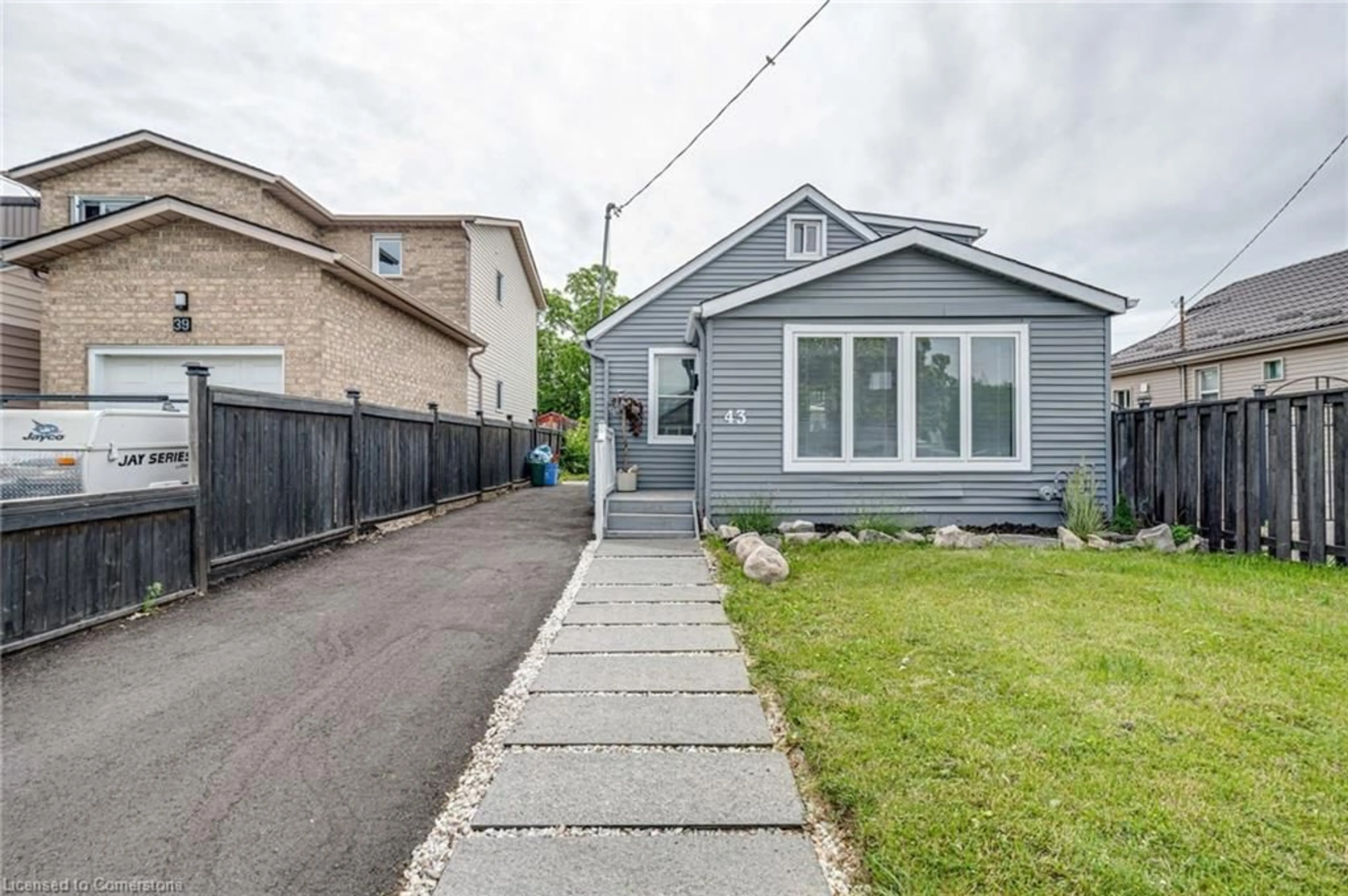 Frontside or backside of a home, cottage for 43 Adair Ave, Hamilton Ontario L8H 1B5