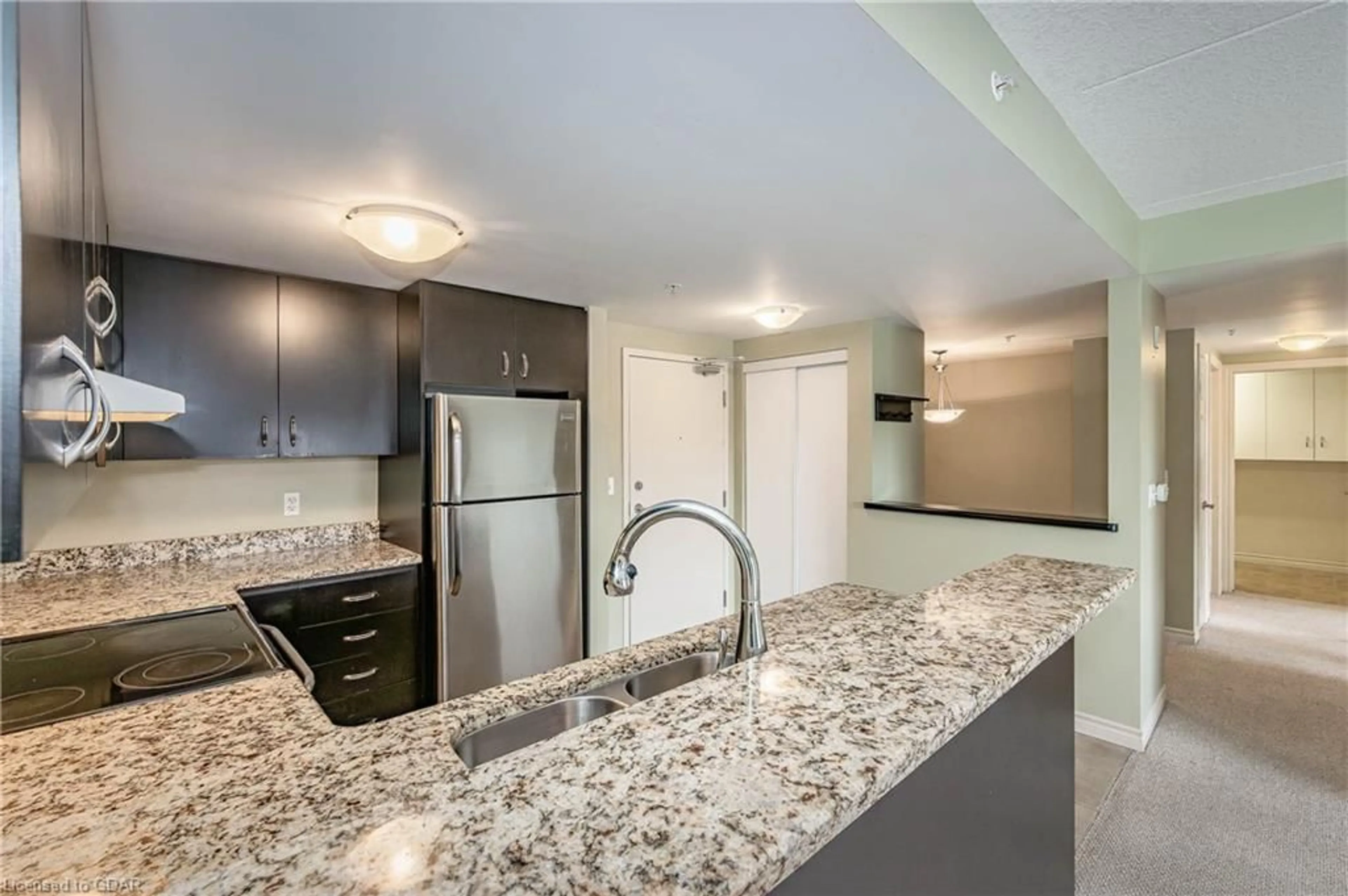 Open concept kitchen for 41 Goodwin Dr #307, Guelph Ontario N1L 0E7