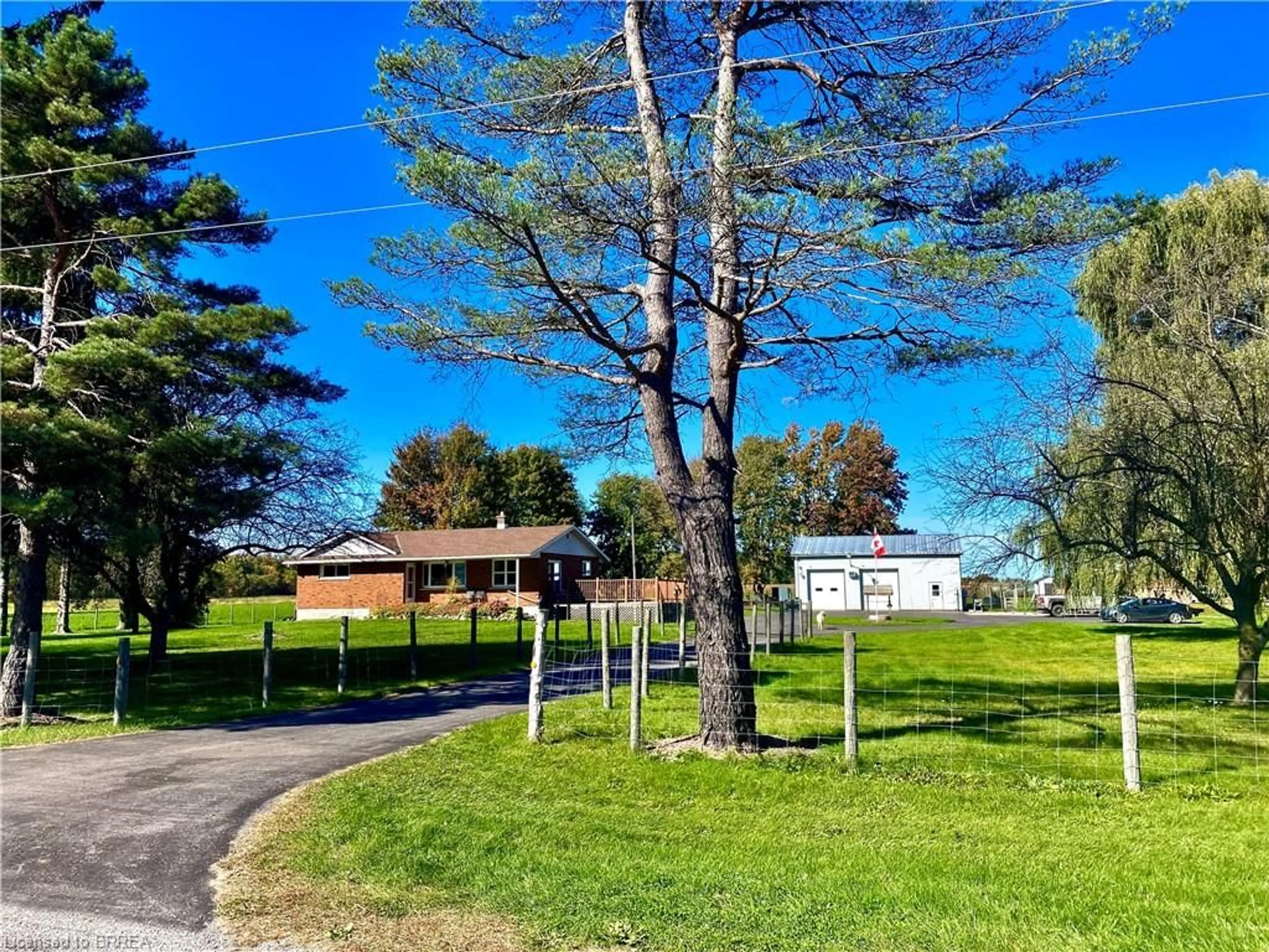 A pic from exterior of the house or condo, the fenced backyard for 1163 Concession 7 Rd, Townsend Ontario N0E 1Y0