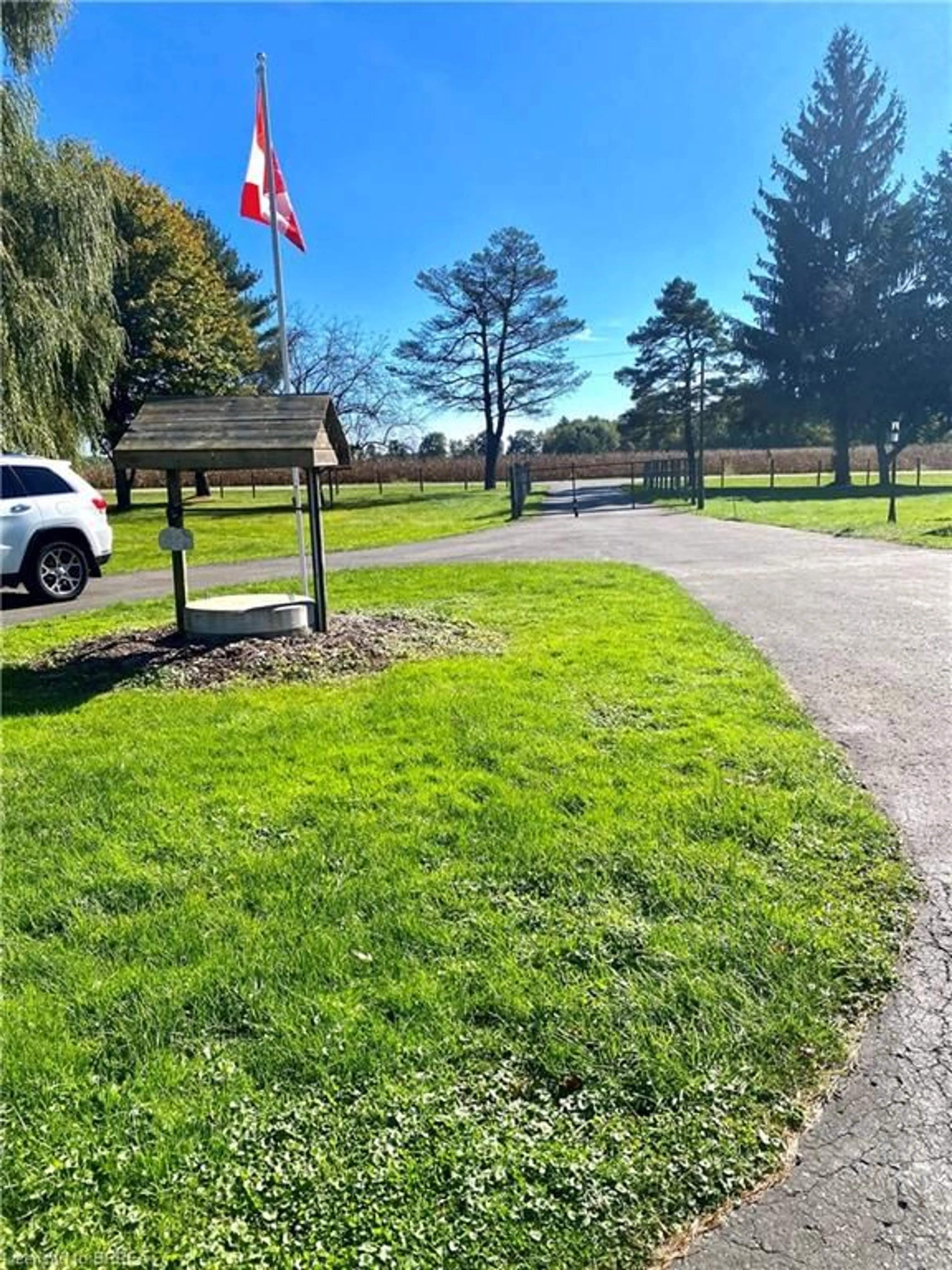 A pic from exterior of the house or condo, the fenced backyard for 1163 Concession 7 Rd, Townsend Ontario N0E 1Y0