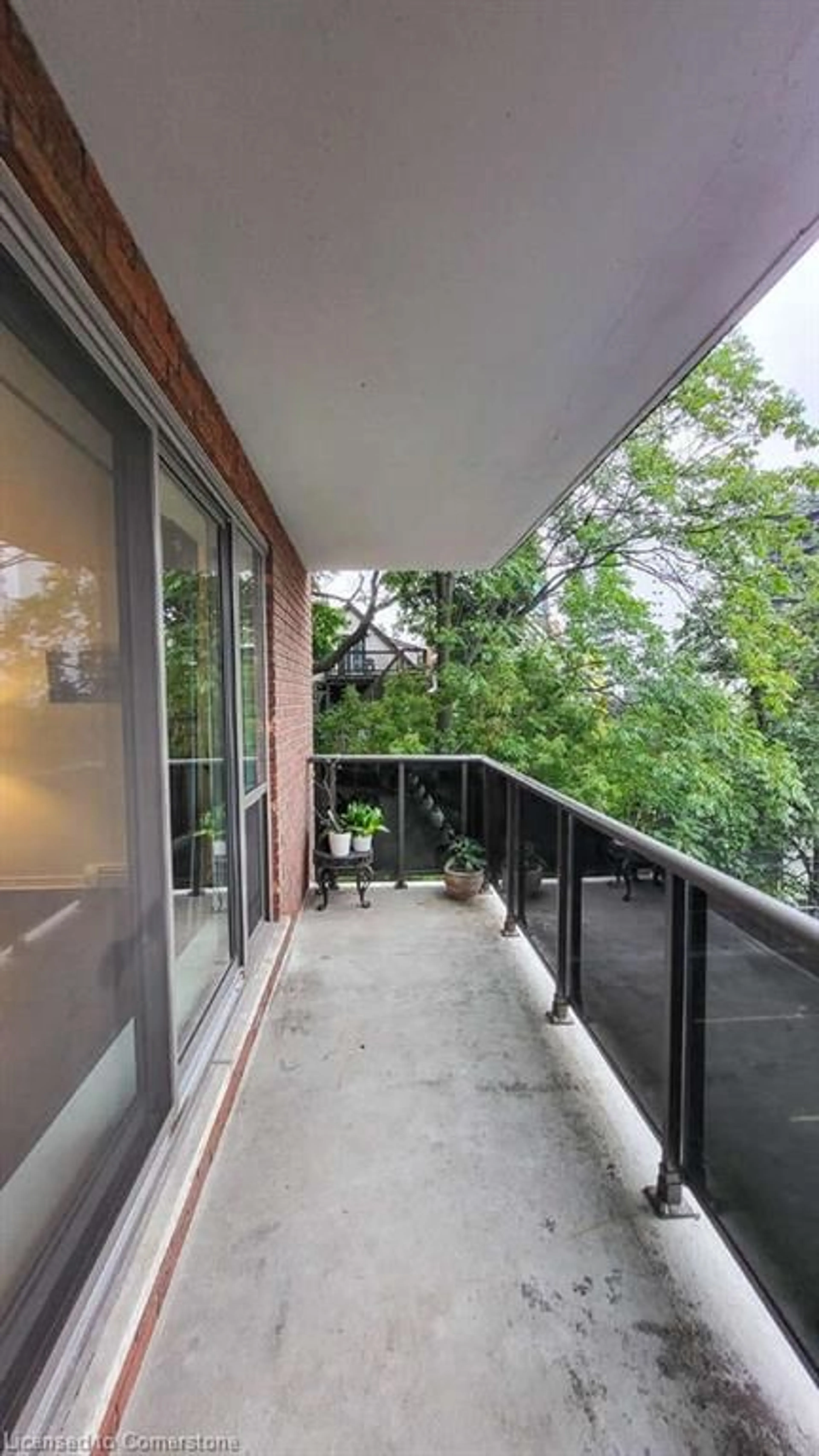 Balcony in the apartment, the street view for 81 Charlton Ave #301, Hamilton Ontario L8N 1Y7