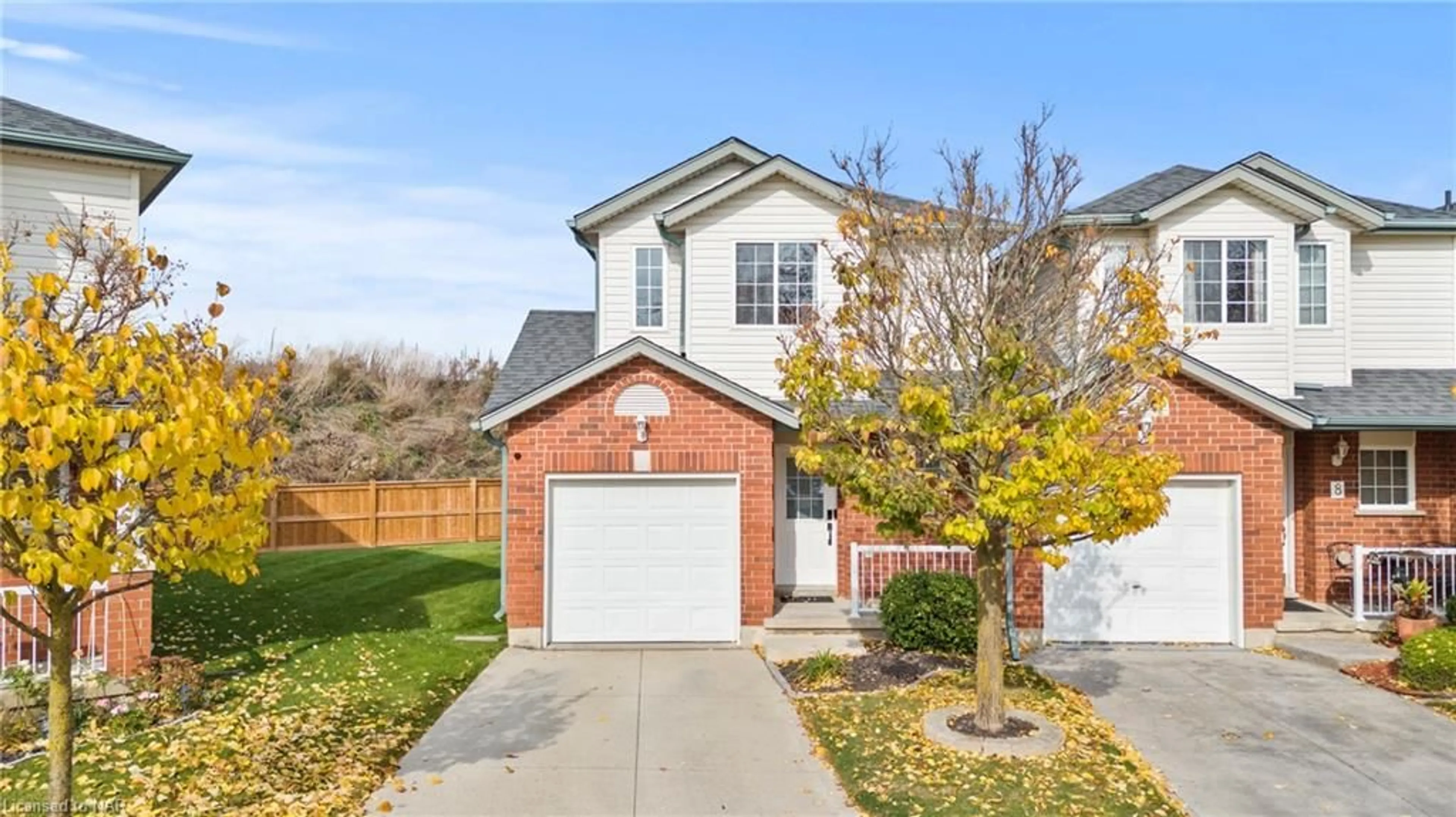 A pic from exterior of the house or condo, the fenced backyard for 10 Stonecairn Dr #7, Cambridge Ontario N1T 1X1