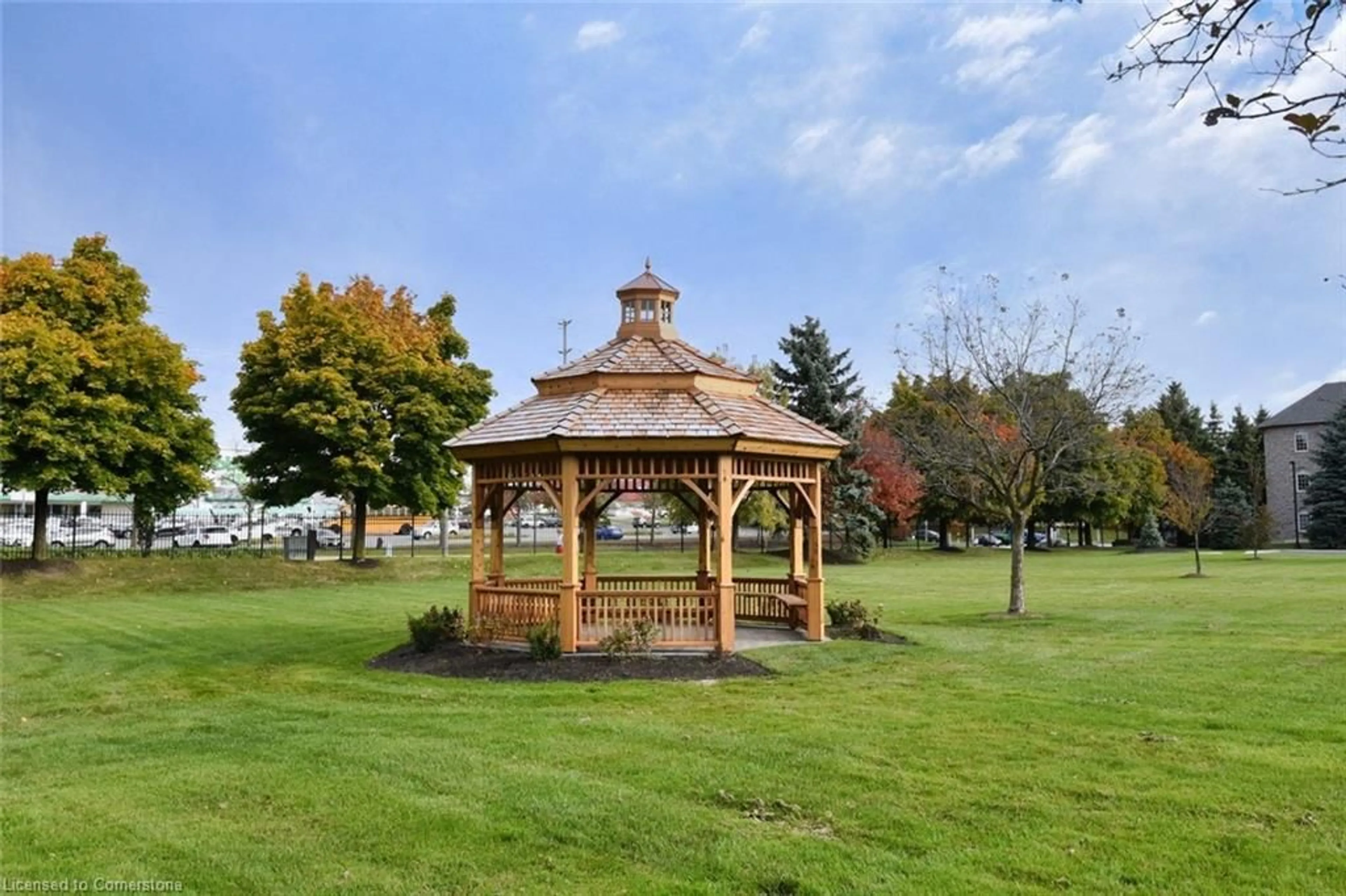 Patio, the fenced backyard for 980 Golf Links Rd #309, Ancaster Ontario L9K 1J8