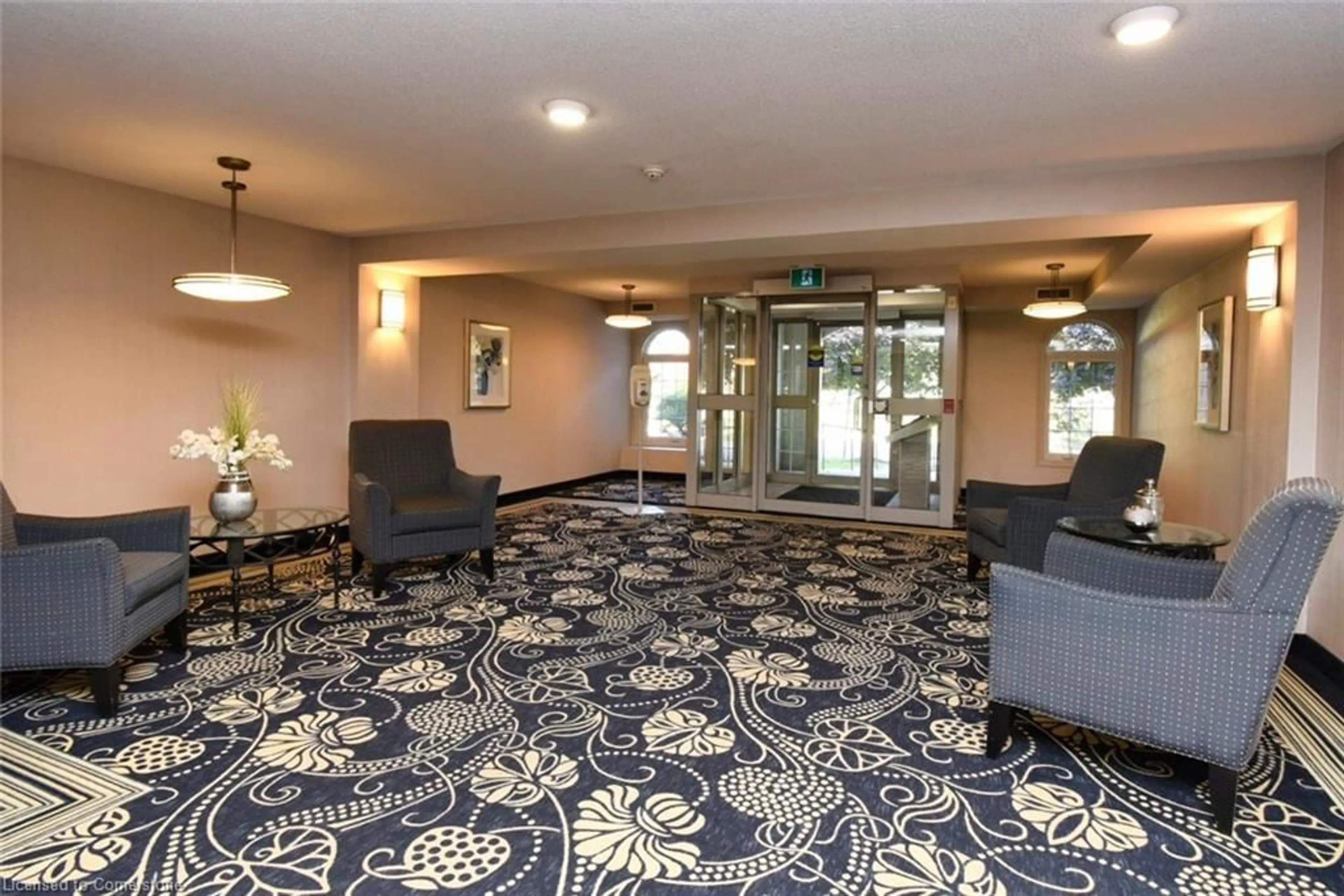 Indoor lobby, carpet floors for 980 Golf Links Rd #309, Ancaster Ontario L9K 1J8