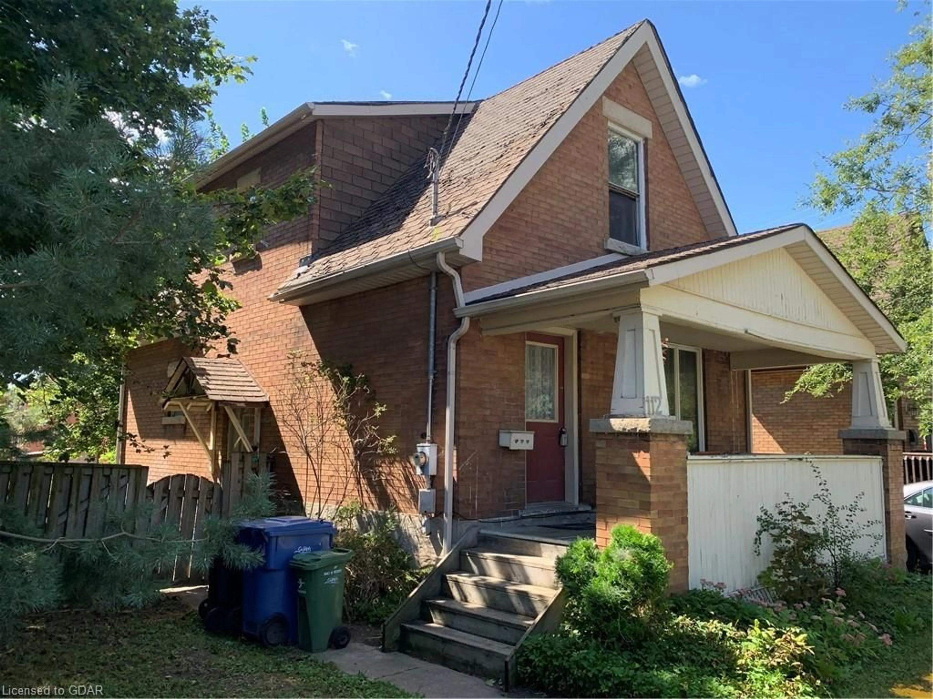 Frontside or backside of a home, the front or back of building for 112 Bagot St, Guelph Ontario N1H 5T6