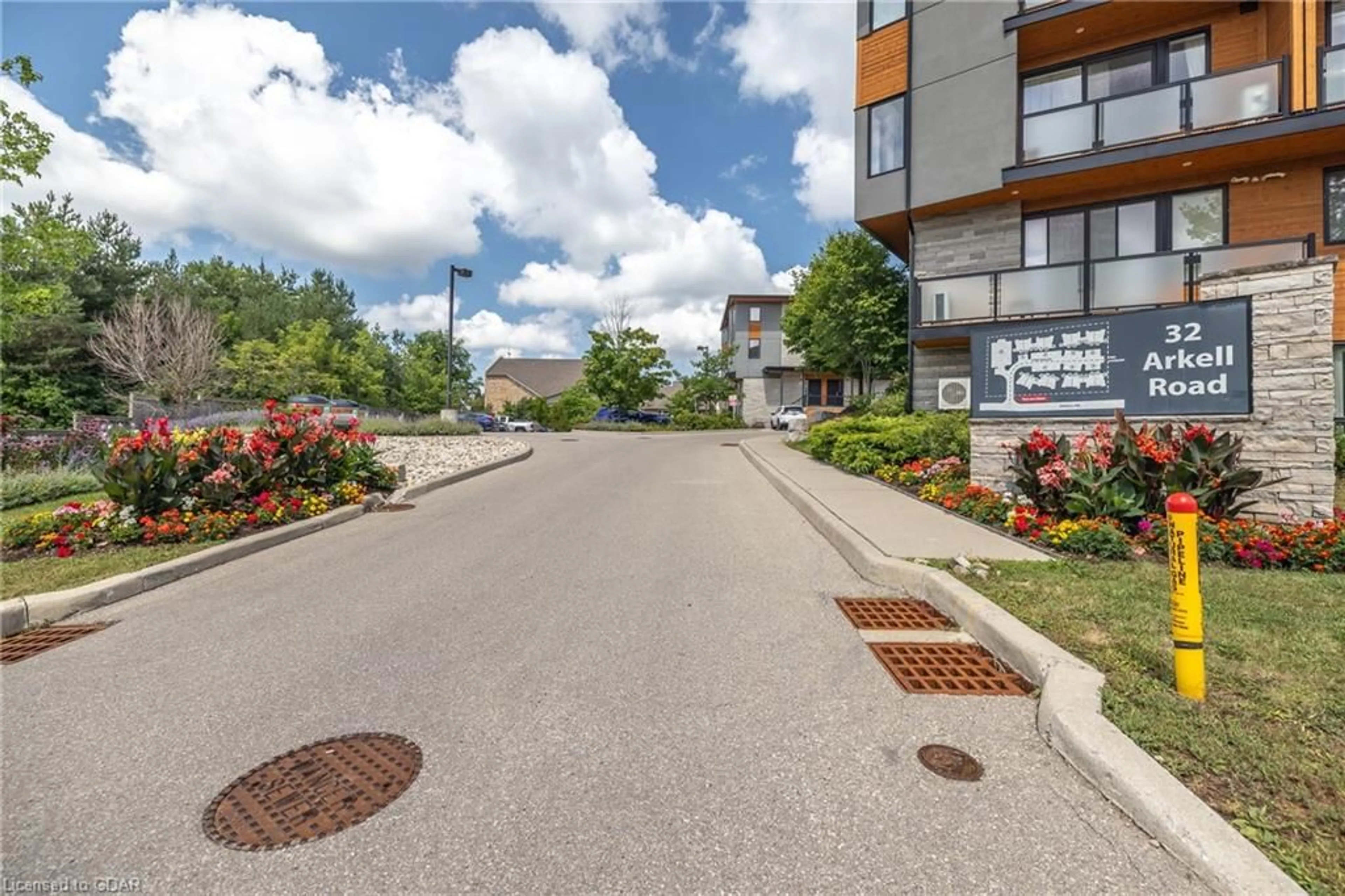 A pic from exterior of the house or condo, the street view for 32 Arkell Rd #17, Guelph Ontario N1L 0L4