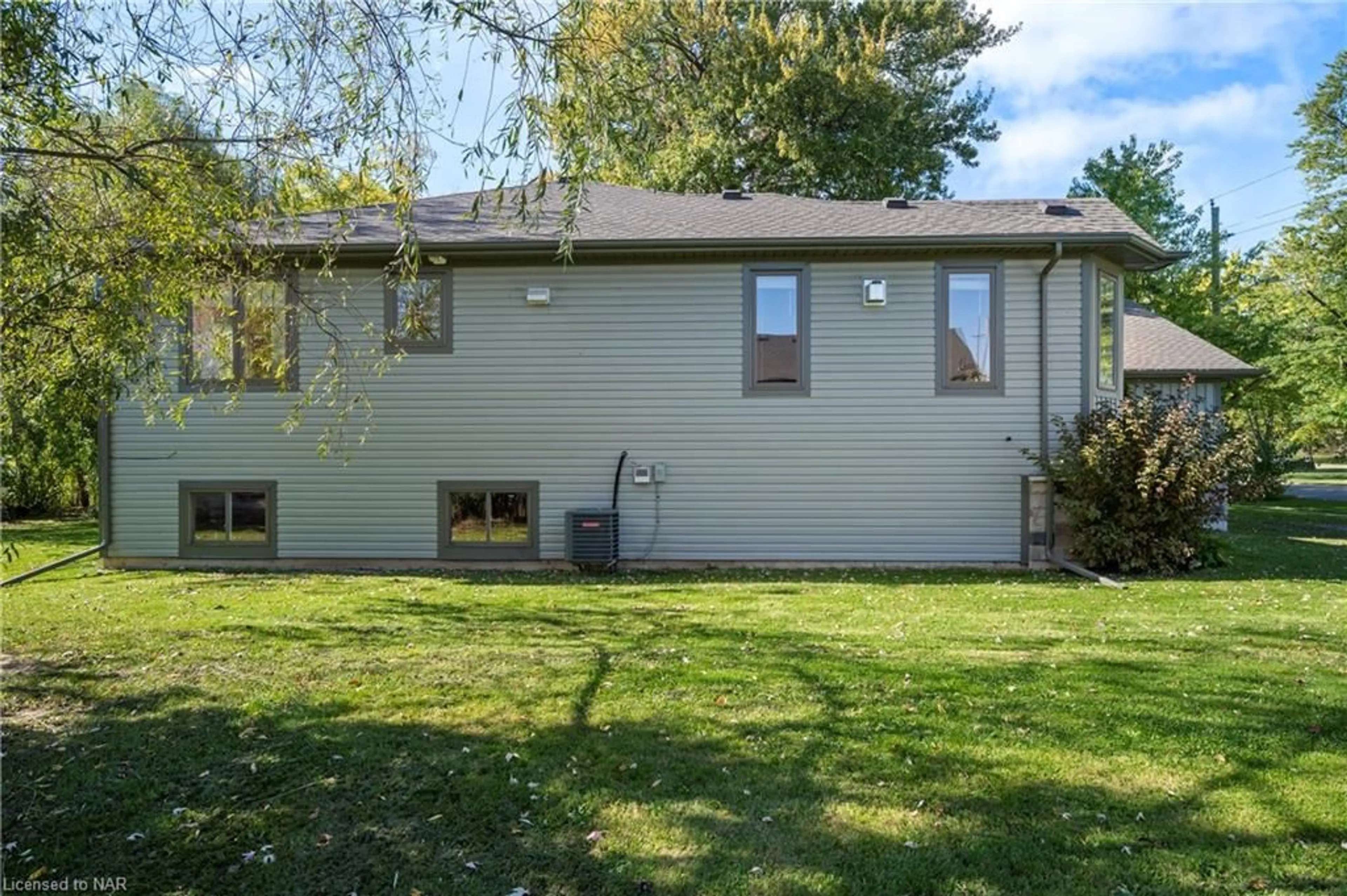 Frontside or backside of a home, the fenced backyard for 4032 Chippawa Pky, Niagara Falls Ontario L2G 6E4