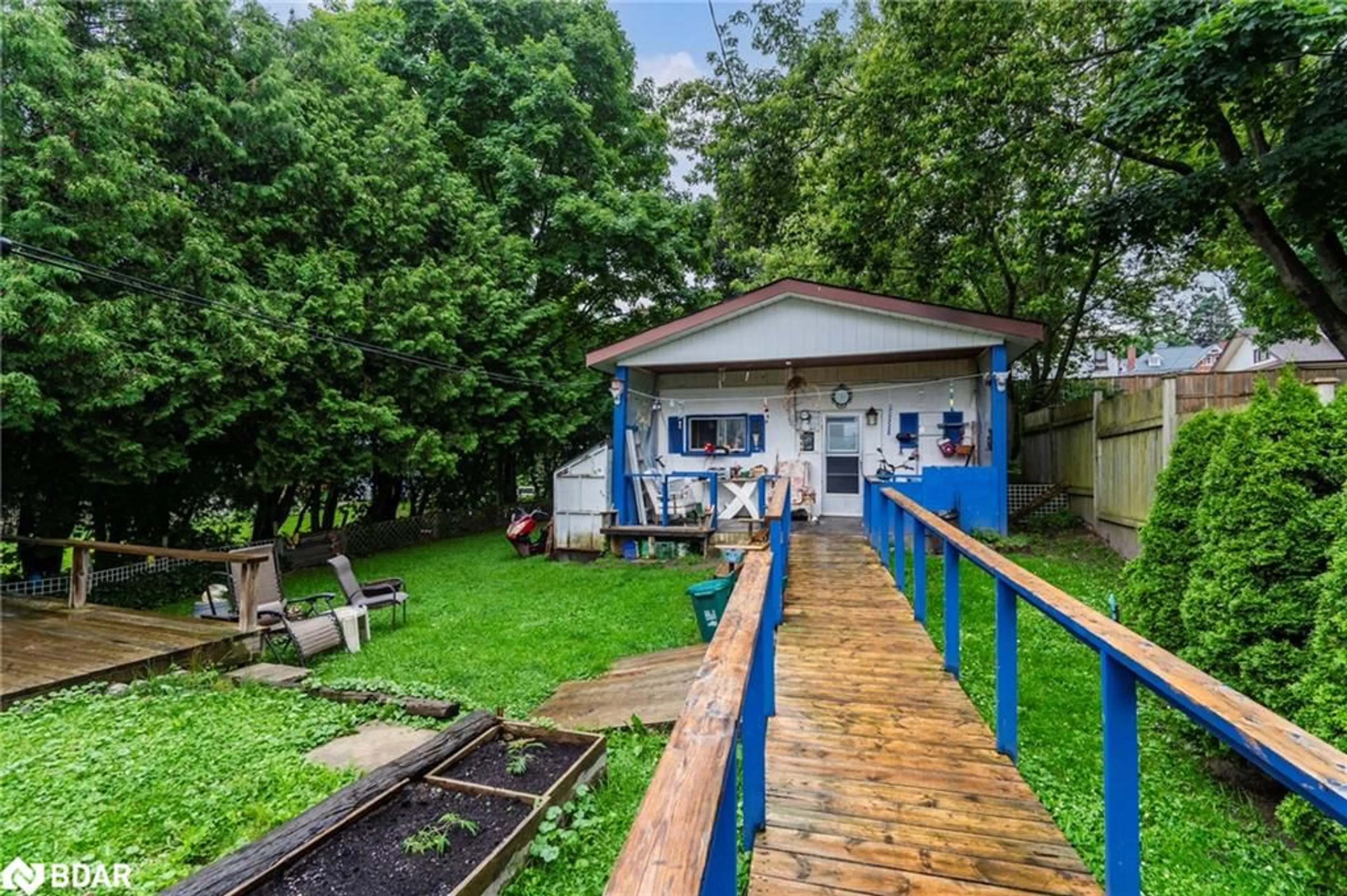 Patio, the fenced backyard for 643 645 Dominion Ave, Midland Ontario L4R 1R7