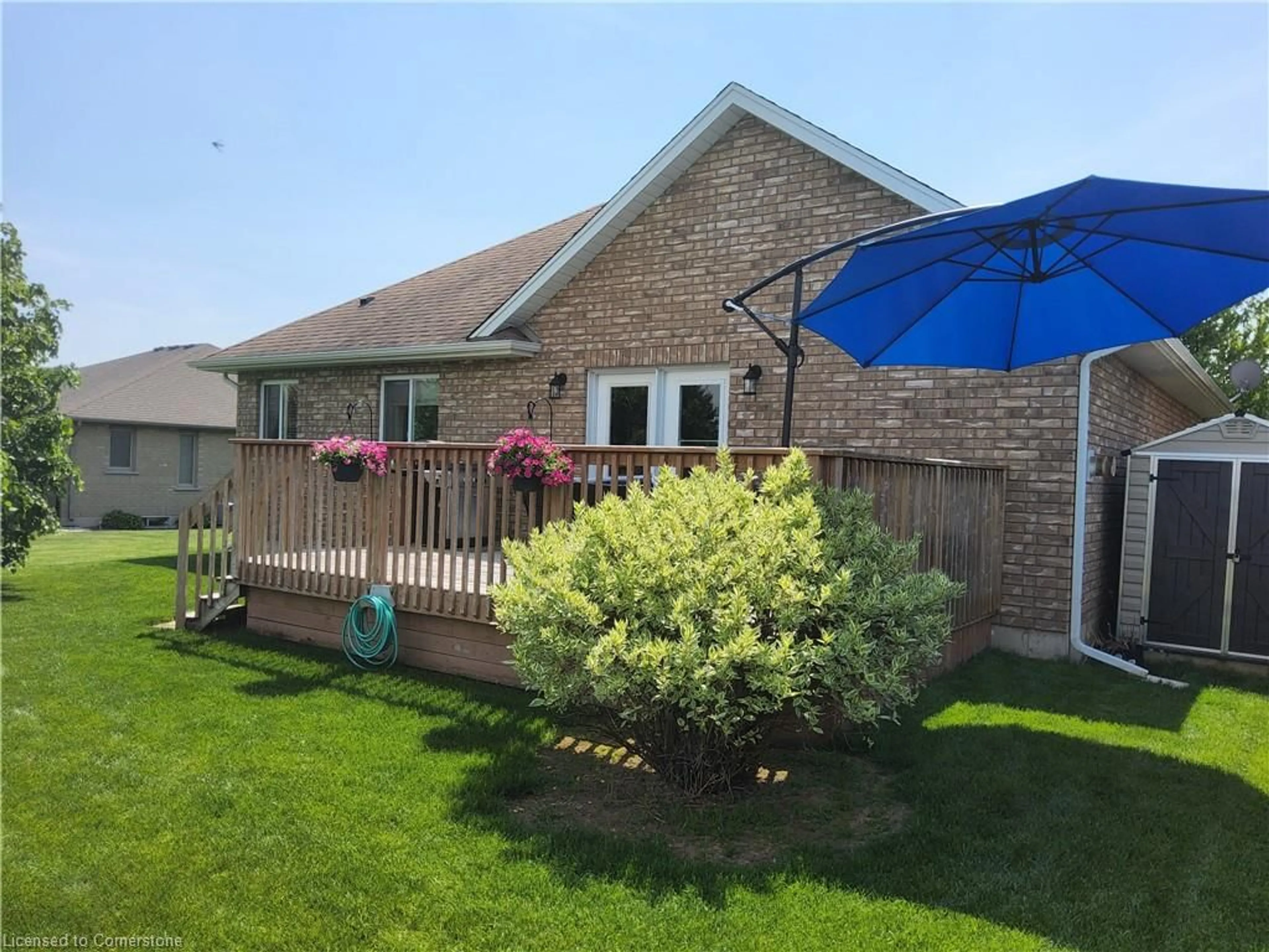 Frontside or backside of a home, the fenced backyard for 39 Driftwood Dr, Simcoe Ontario N3Y 0A3