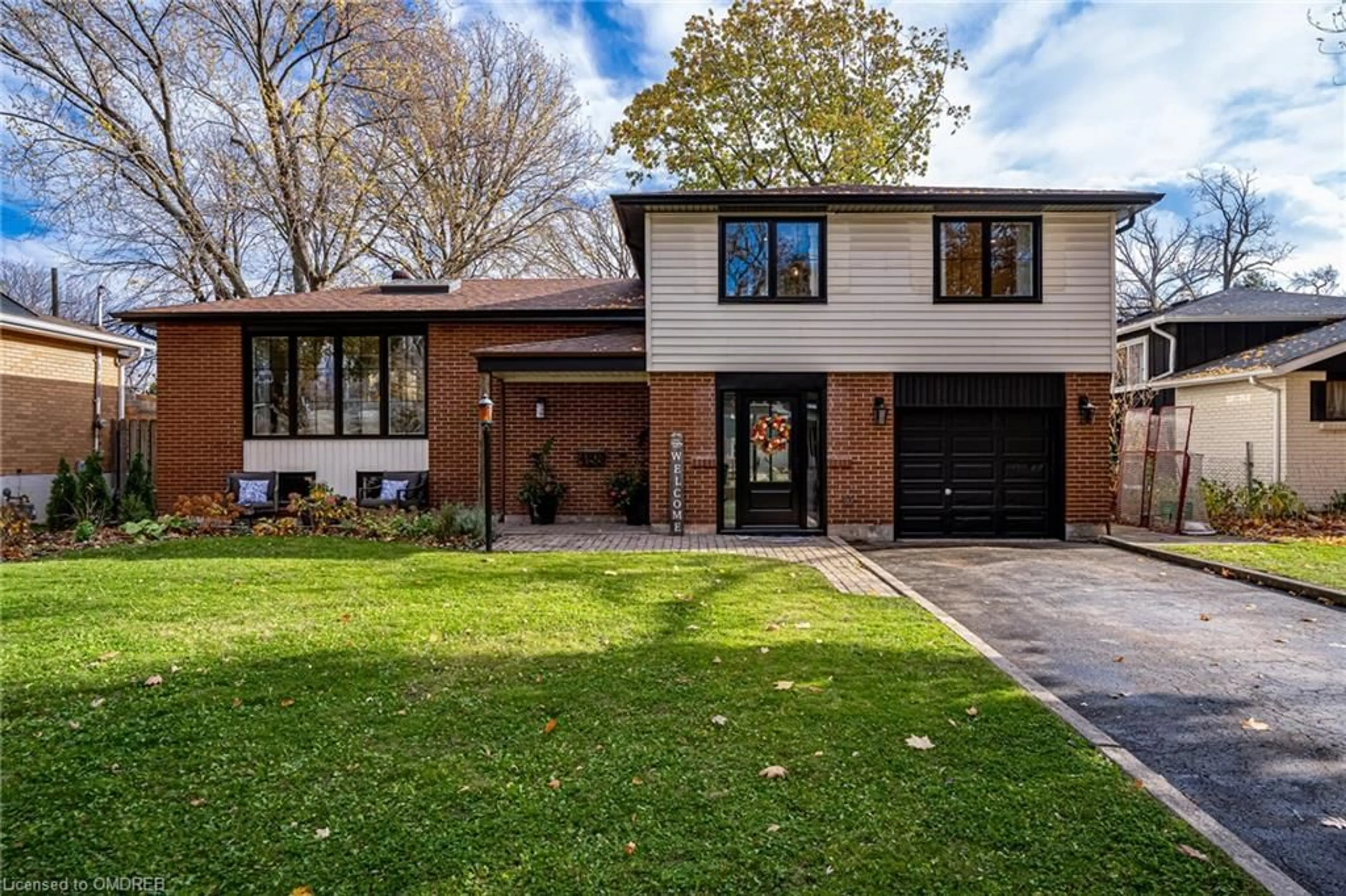 Home with brick exterior material for 488 Kenmarr Cres, Burlington Ontario L7L 4R7