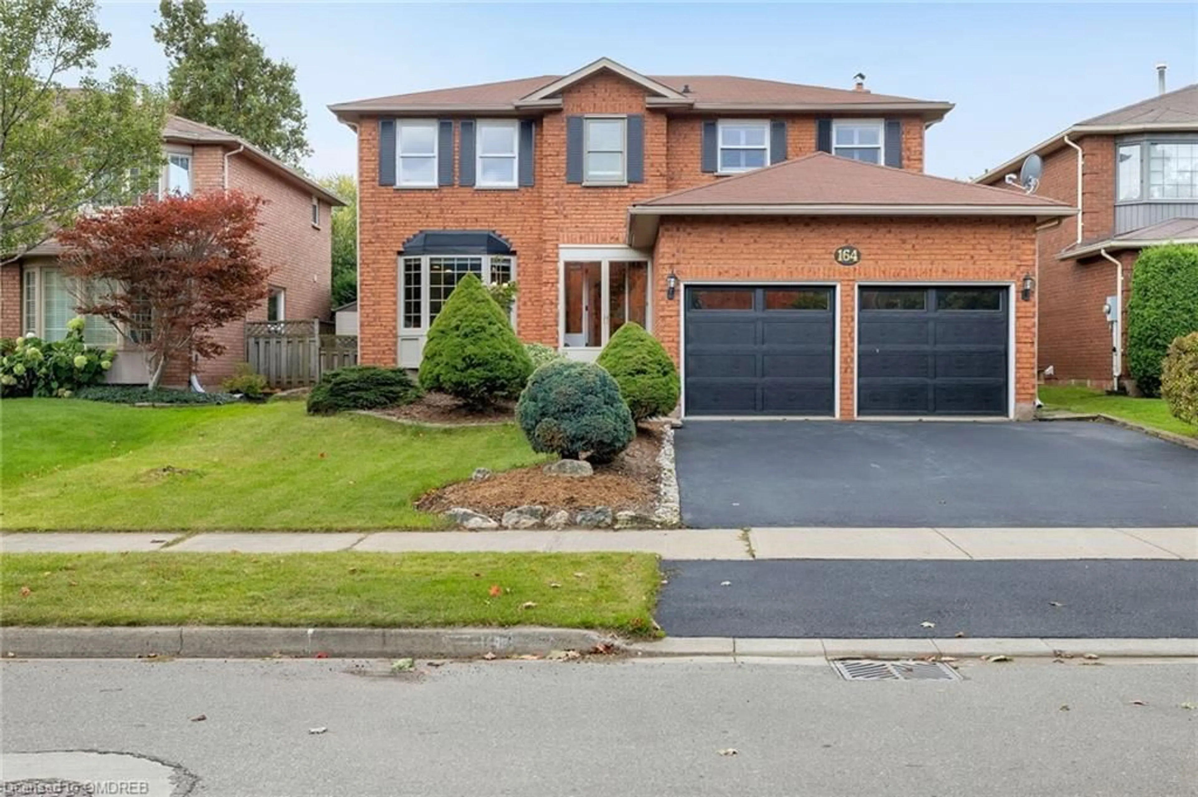 Home with brick exterior material for 164 Warner Dr, Oakville Ontario L6L 6E7