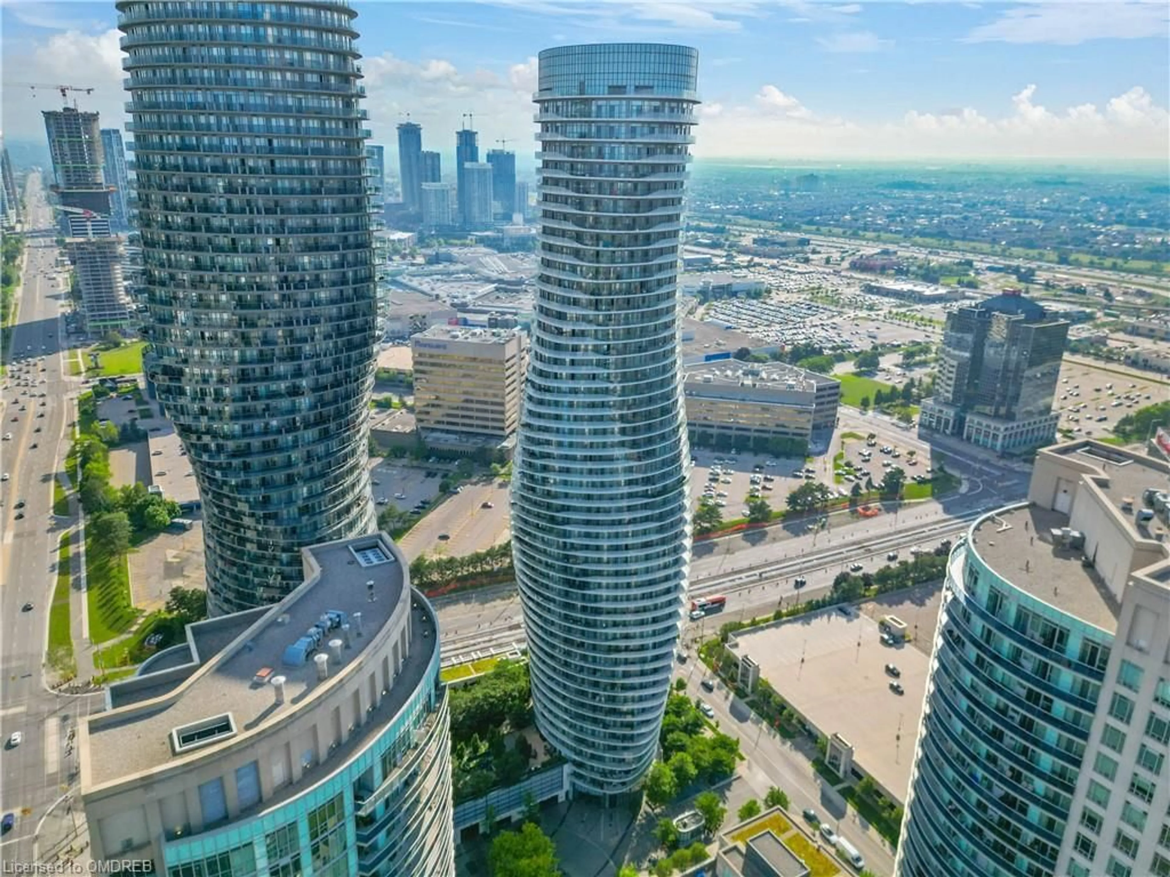 A pic from exterior of the house or condo, the view of city buildings for 50 Absolute Ave #PH3 - 5003, Mississauga Ontario L4Z 0A8