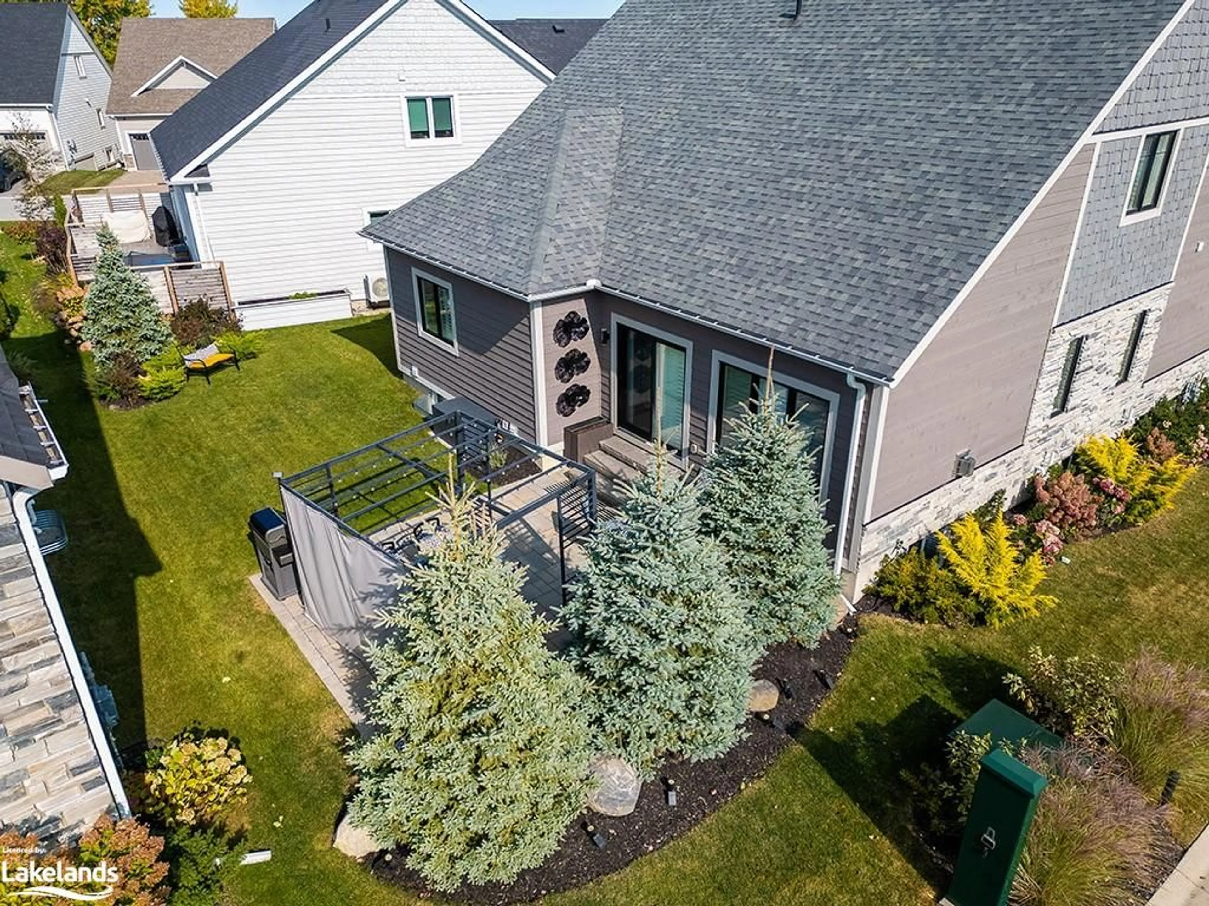 Frontside or backside of a home, the fenced backyard for 112 Admirals Trail, Thornbury Ontario N0H 2P0