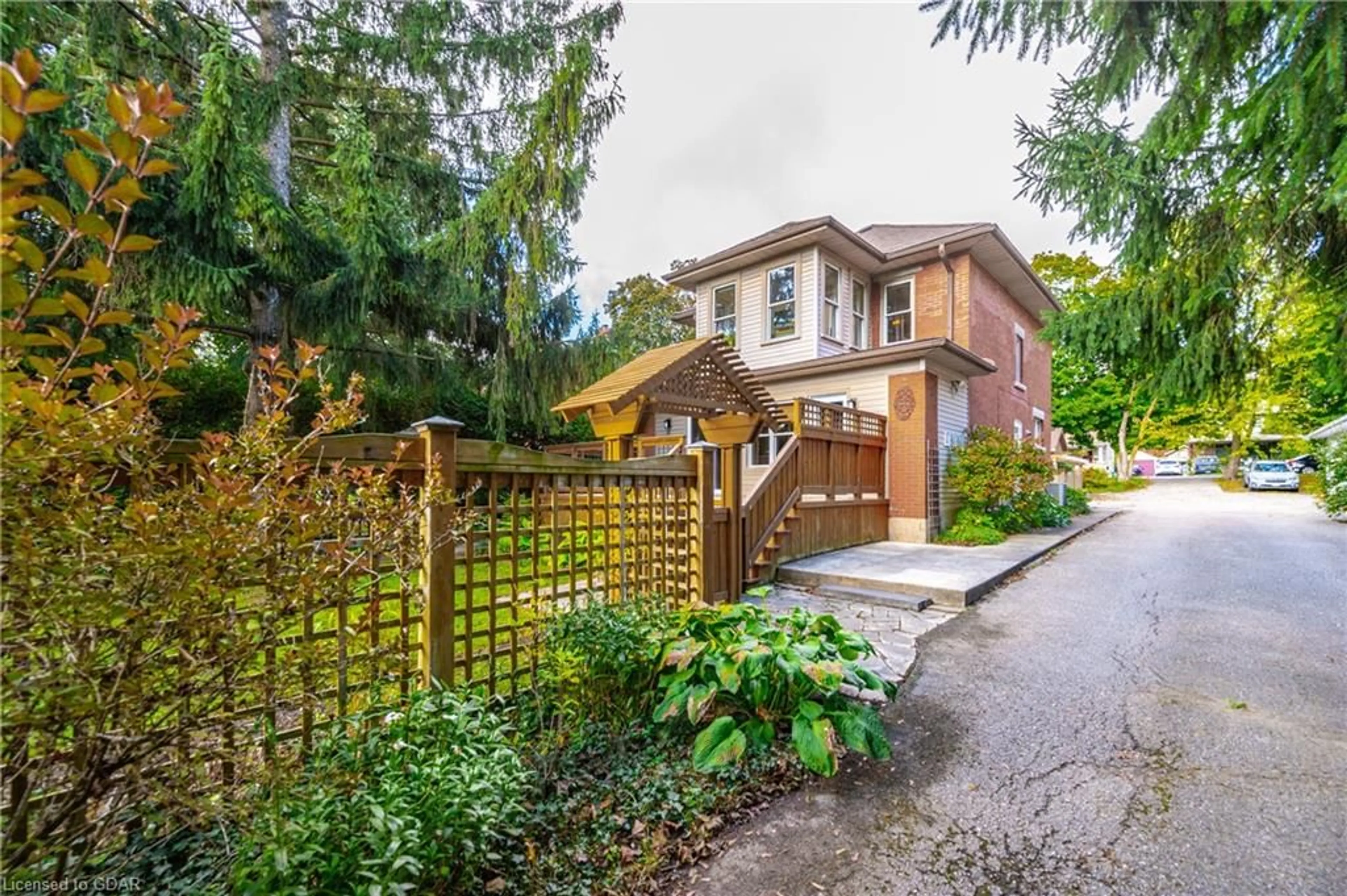 Frontside or backside of a home, the fenced backyard for 315 St Andrew St, Fergus Ontario N1M 1R3