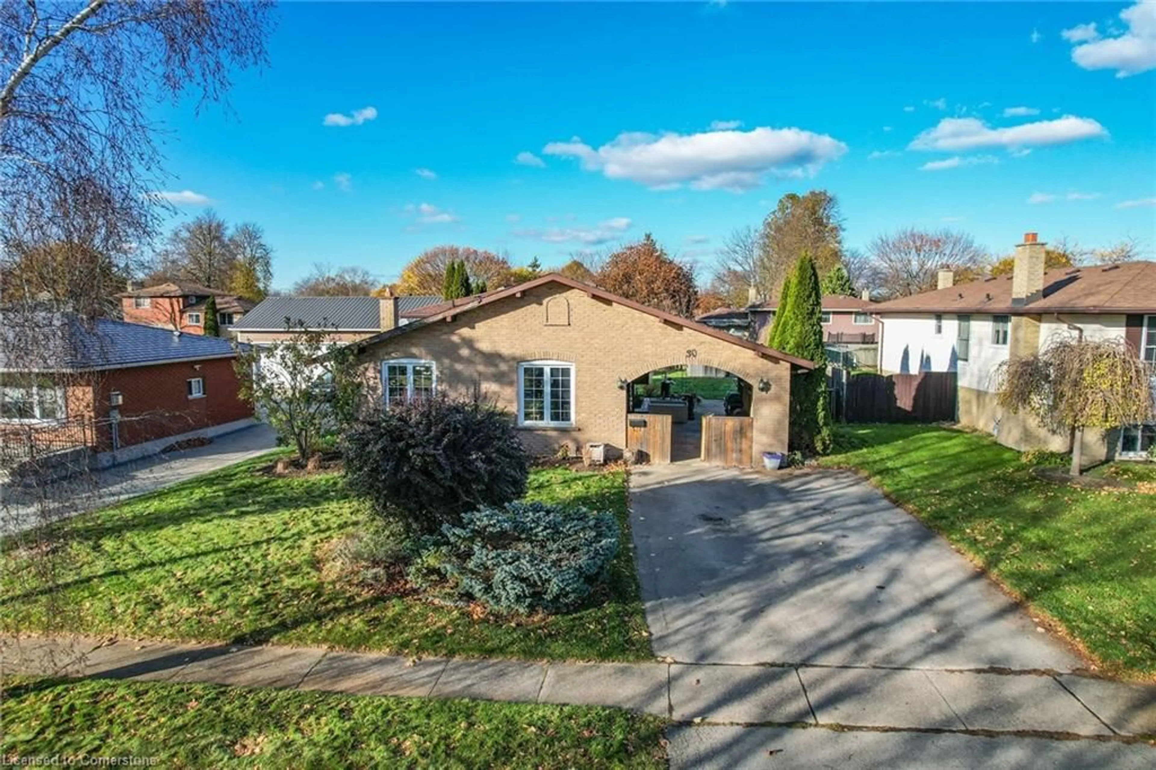 Frontside or backside of a home, the fenced backyard for 30 Rolling Acres Dr, Welland Ontario L3C 3N3