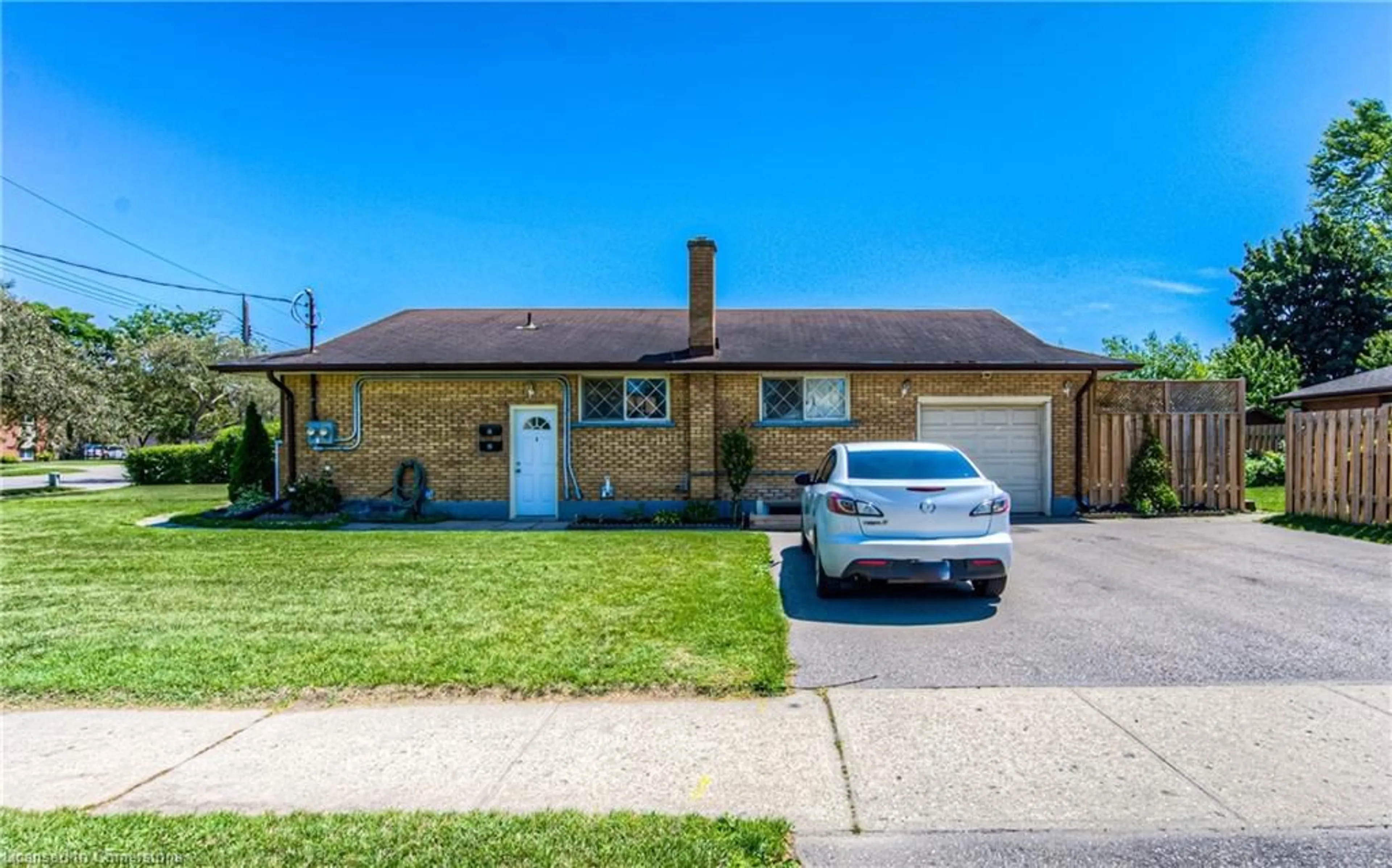 Frontside or backside of a home, the street view for 27 Weichel St, Kitchener Ontario N2M 2A7