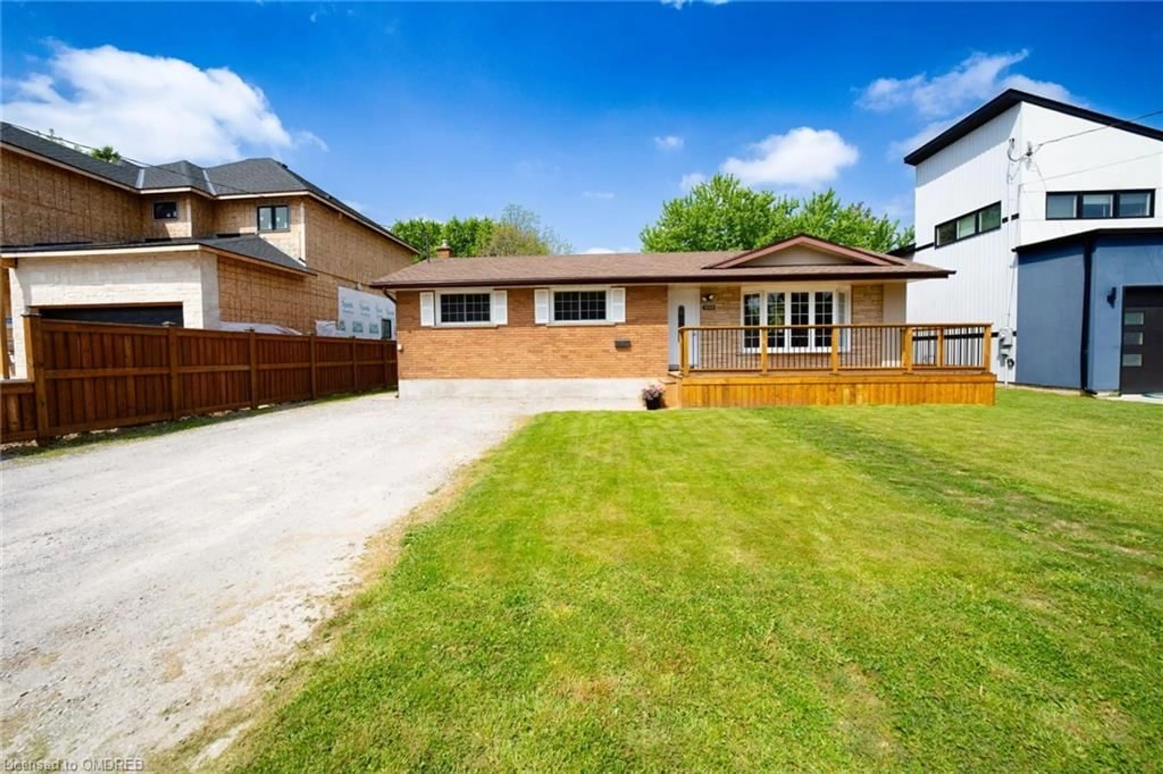 Frontside or backside of a home, the fenced backyard for 3223 Dorchester Rd, Niagara Falls Ontario L2J 2Z9