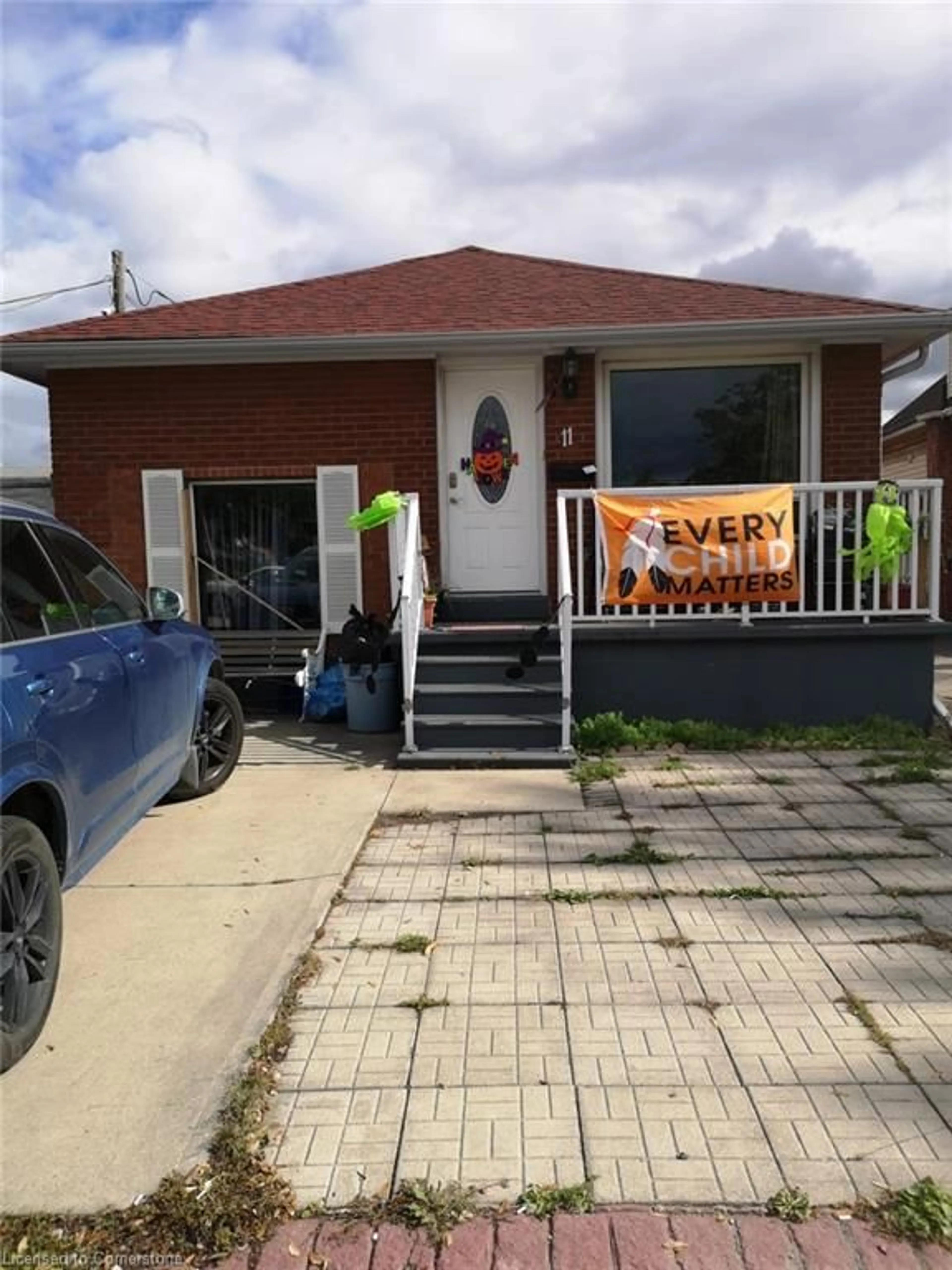 Frontside or backside of a home, the street view for 11 Parkdale Ave, Hamilton Ontario L8H 1B1