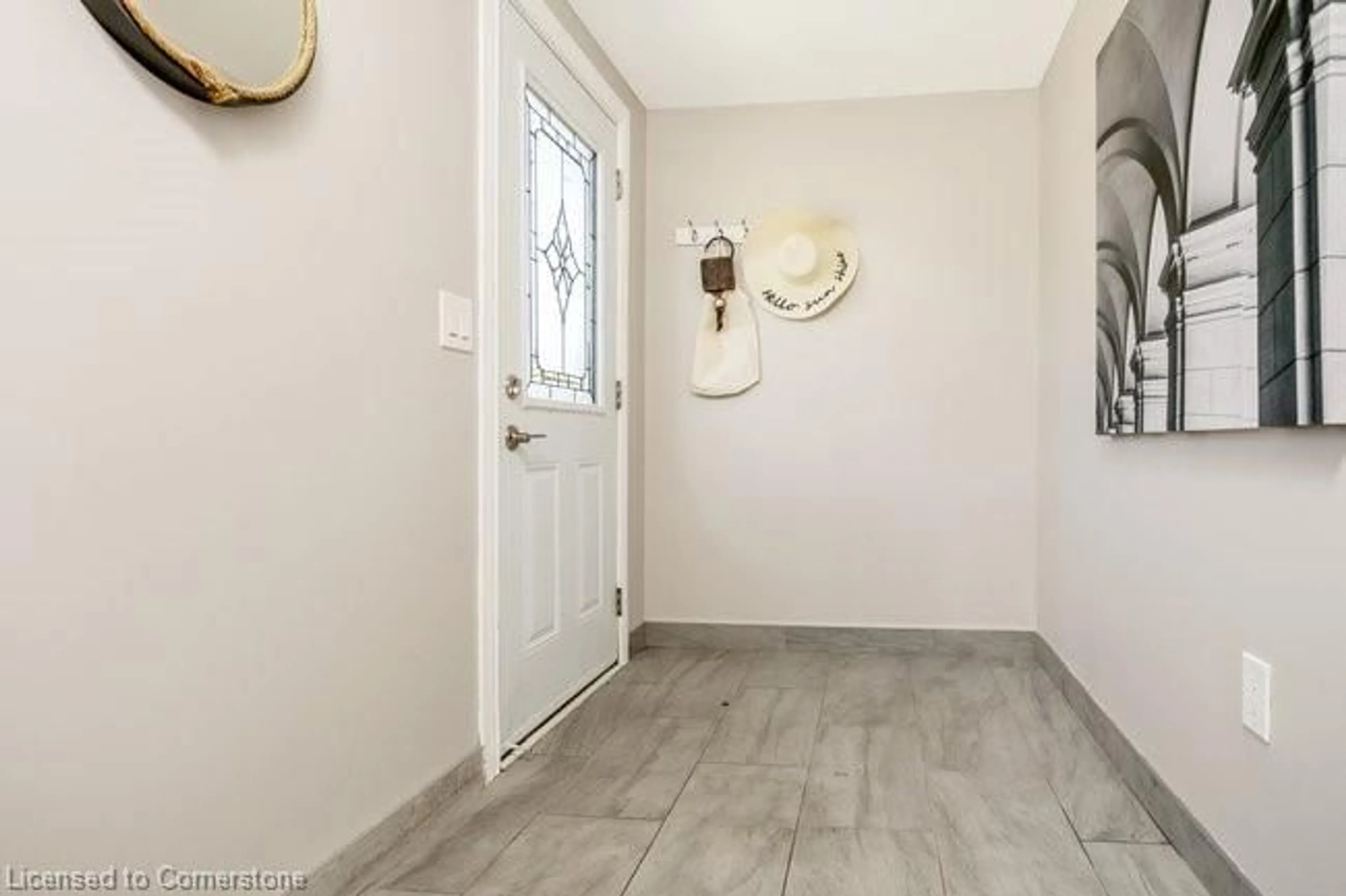 Indoor entryway, wood floors for 224 Brucedale Ave, Hamilton Ontario L9A 1P3