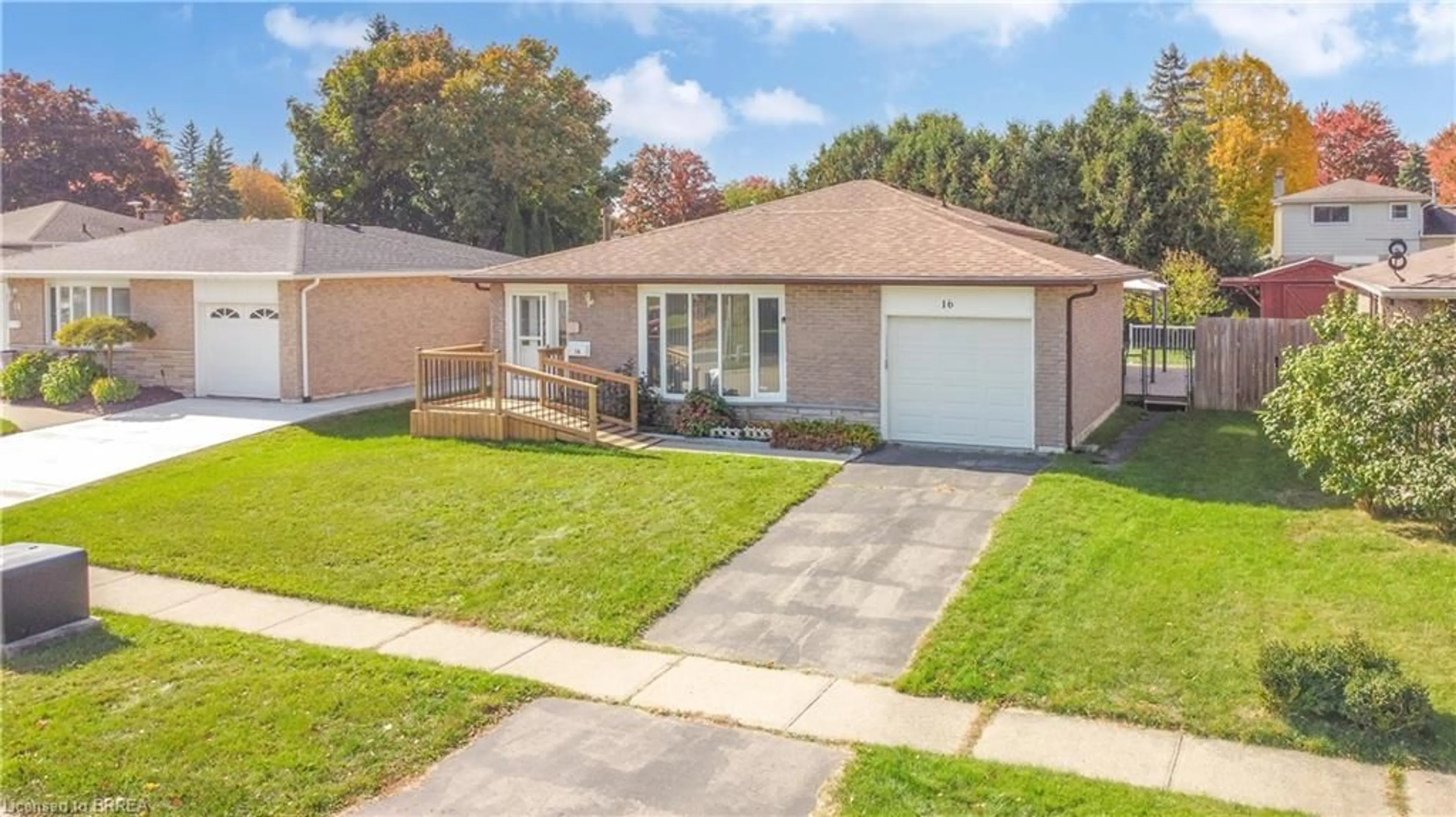 Frontside or backside of a home, the fenced backyard for 16 Larkspur Lane, Paris Ontario N3L 3P1