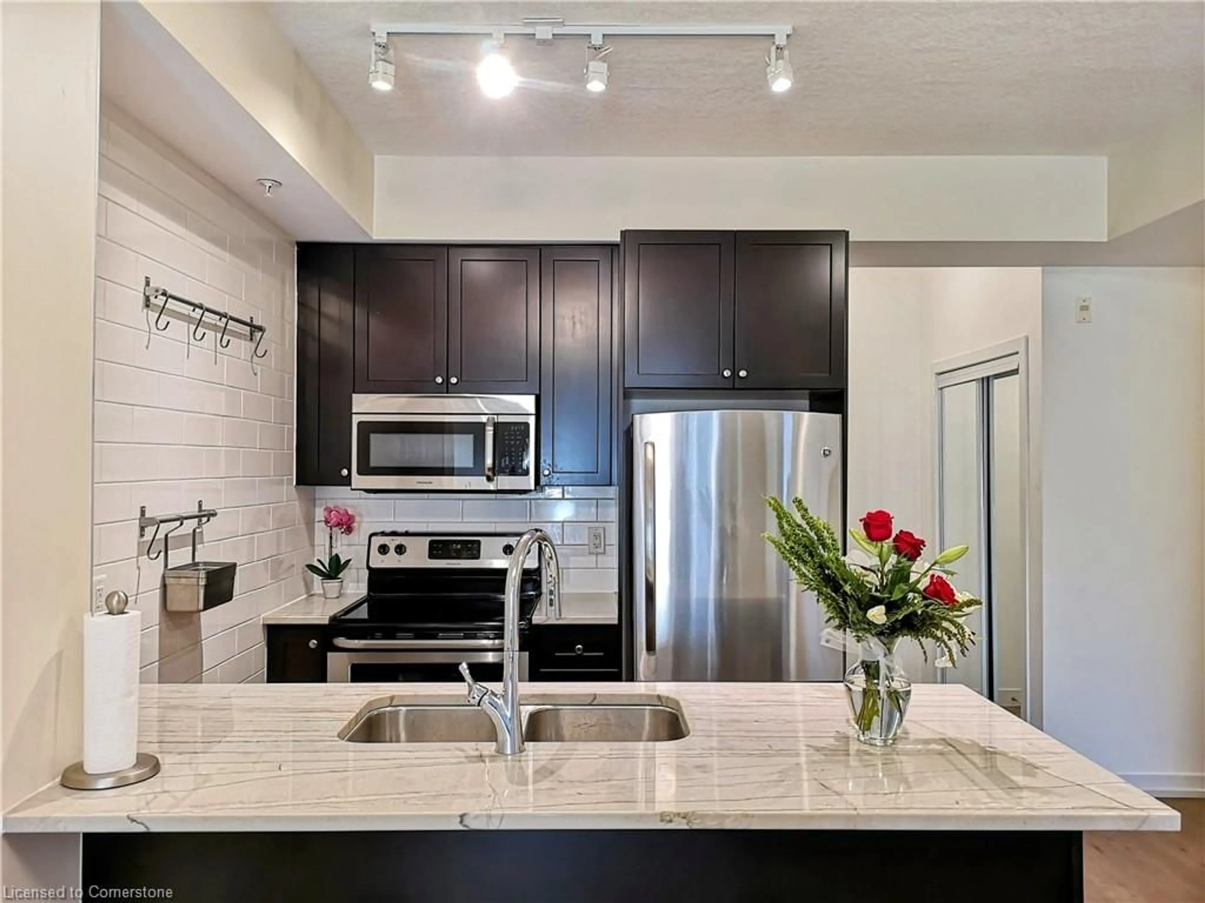 Open concept kitchen for 85 Robinson St #201, Hamilton Ontario L8P 0B9