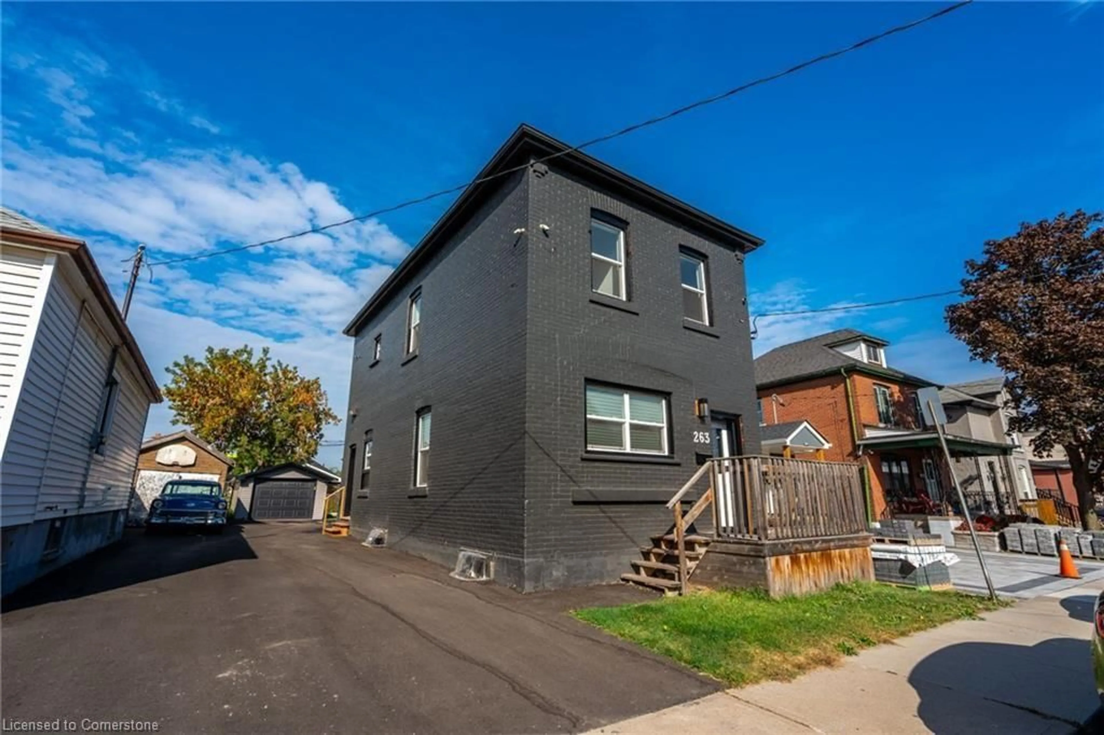 Frontside or backside of a home, the front or back of building for 263 Kensington Ave, Hamilton Ontario L8L 7N8