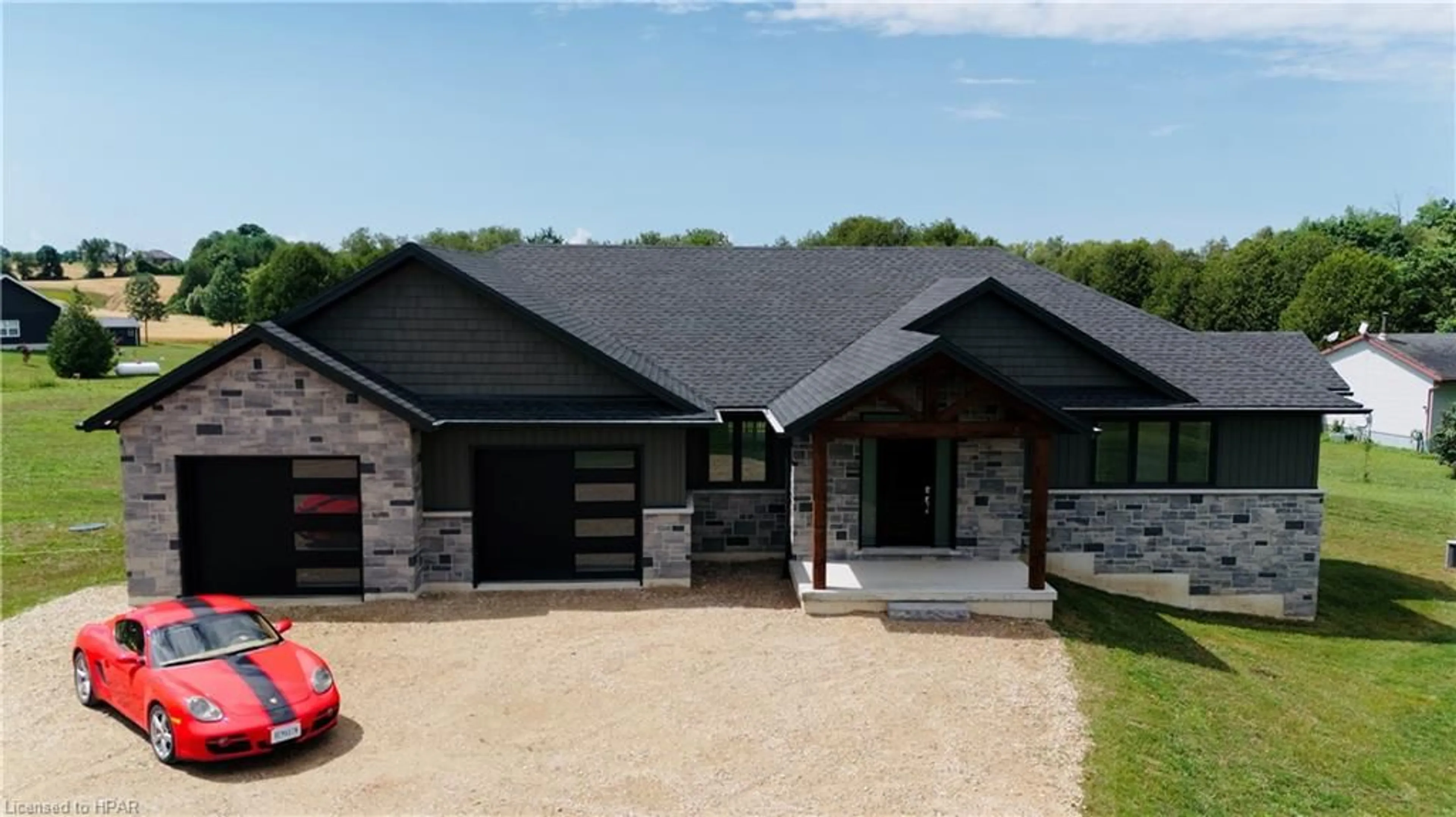 Home with brick exterior material for 6450 Given Rd, Minto Twp Ontario N0G 1M0