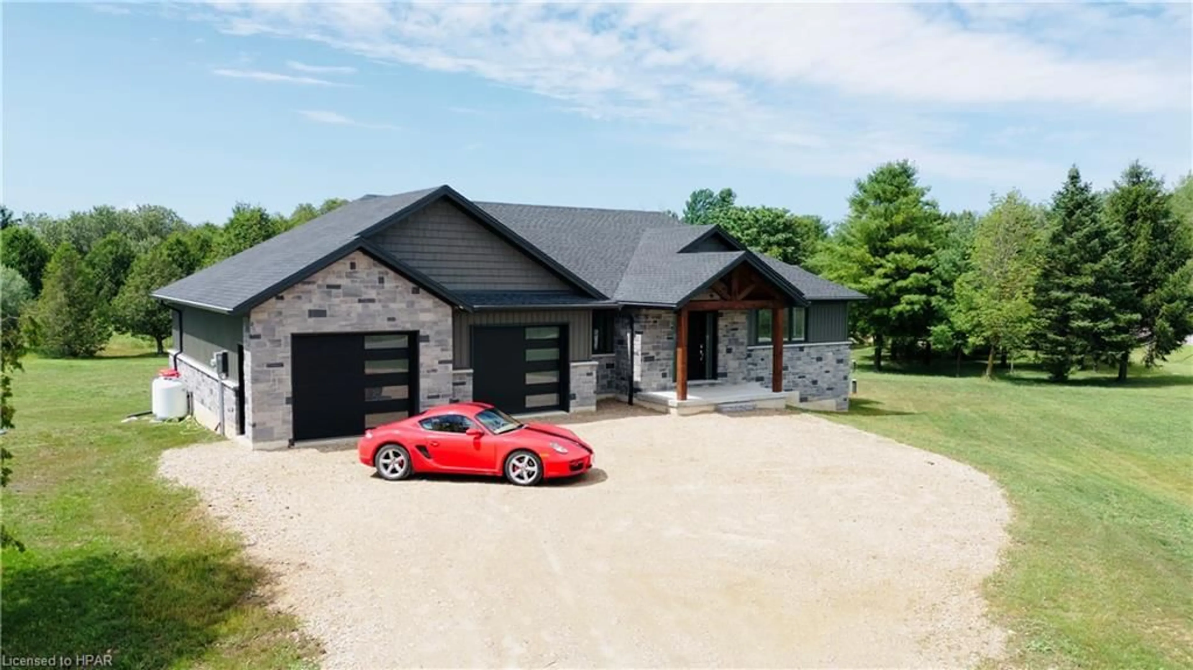 Home with brick exterior material for 6450 Given Rd, Minto Twp Ontario N0G 1M0