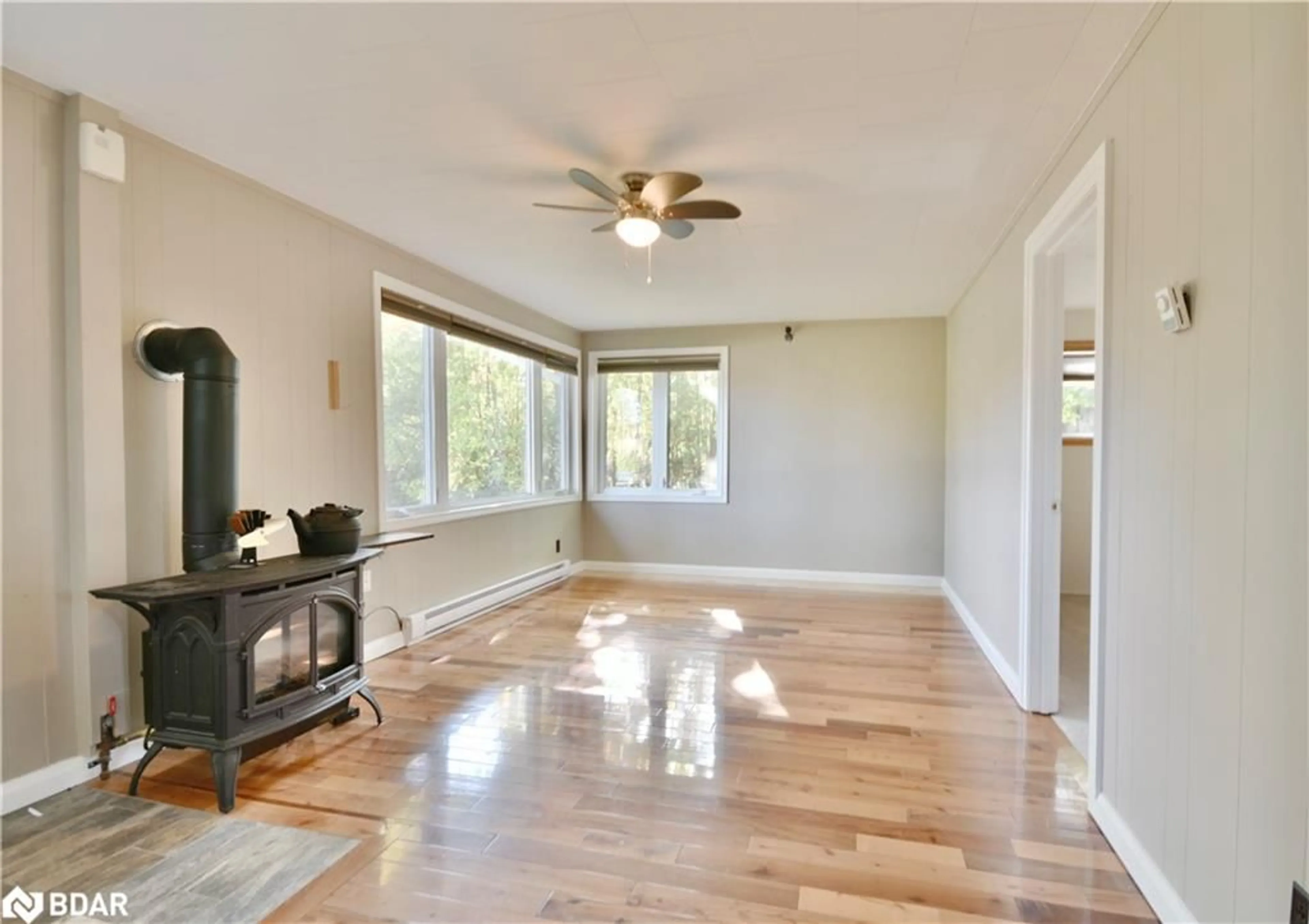 A pic of a room, wood floors for 98 Lakeshore Rd, Oro-Medonte Ontario L0L 2E0