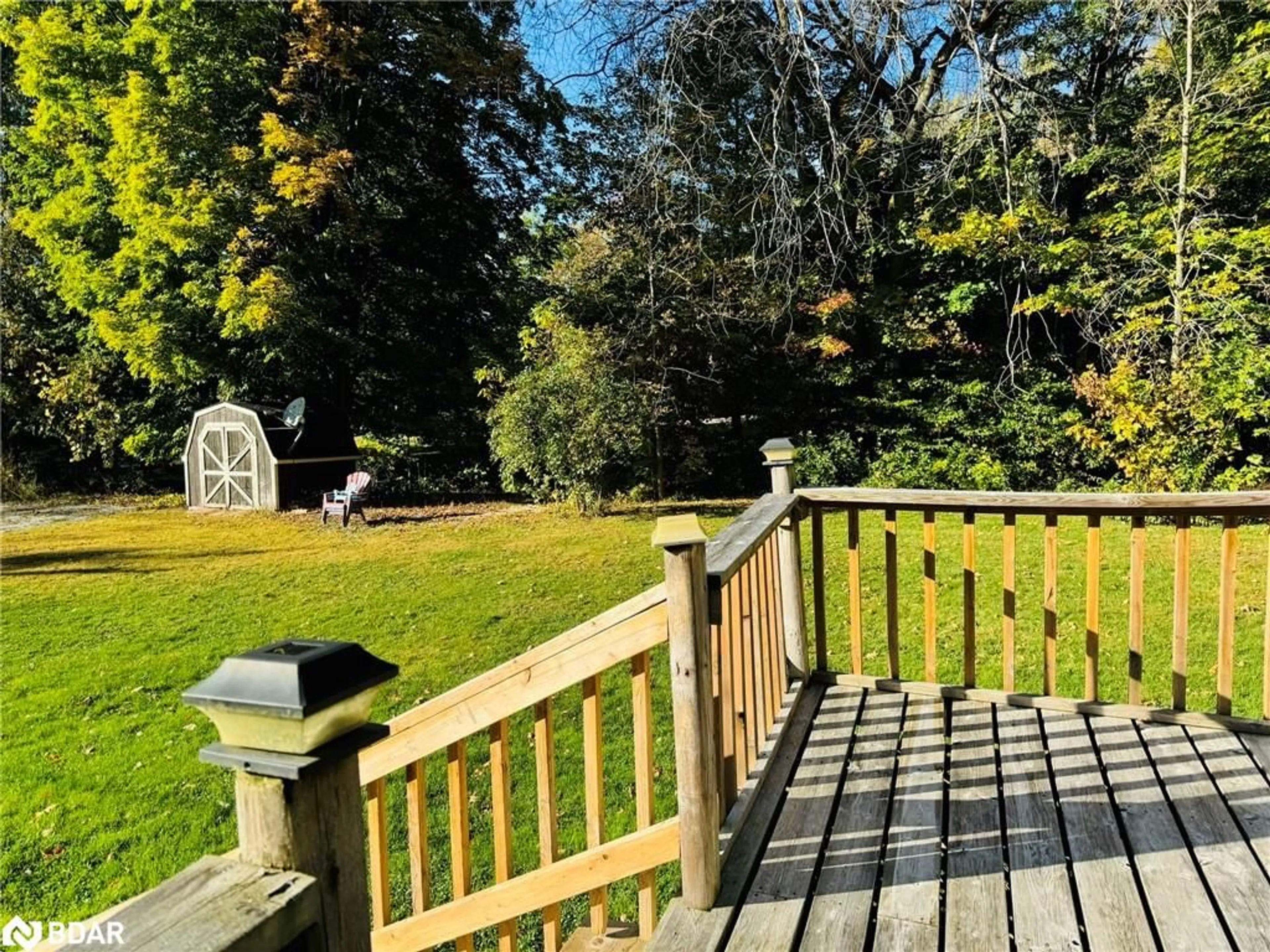 Patio, the fenced backyard for 144 Lake Dalrymple Rd, Sebright Ontario L0K 1W0