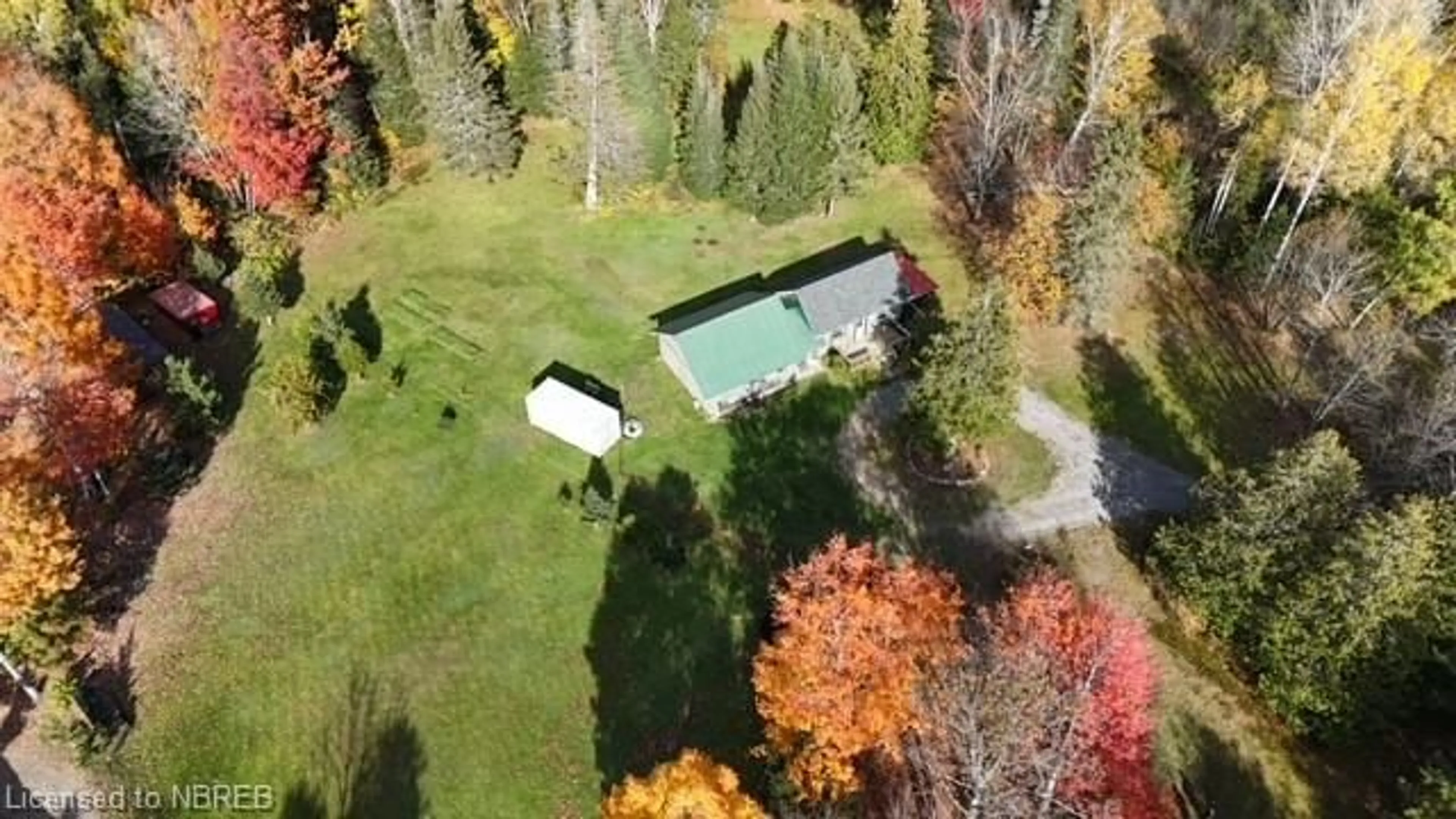 A pic from exterior of the house or condo, the fenced backyard for 615 Development Rd, Bonfield Ontario P0H 2E0