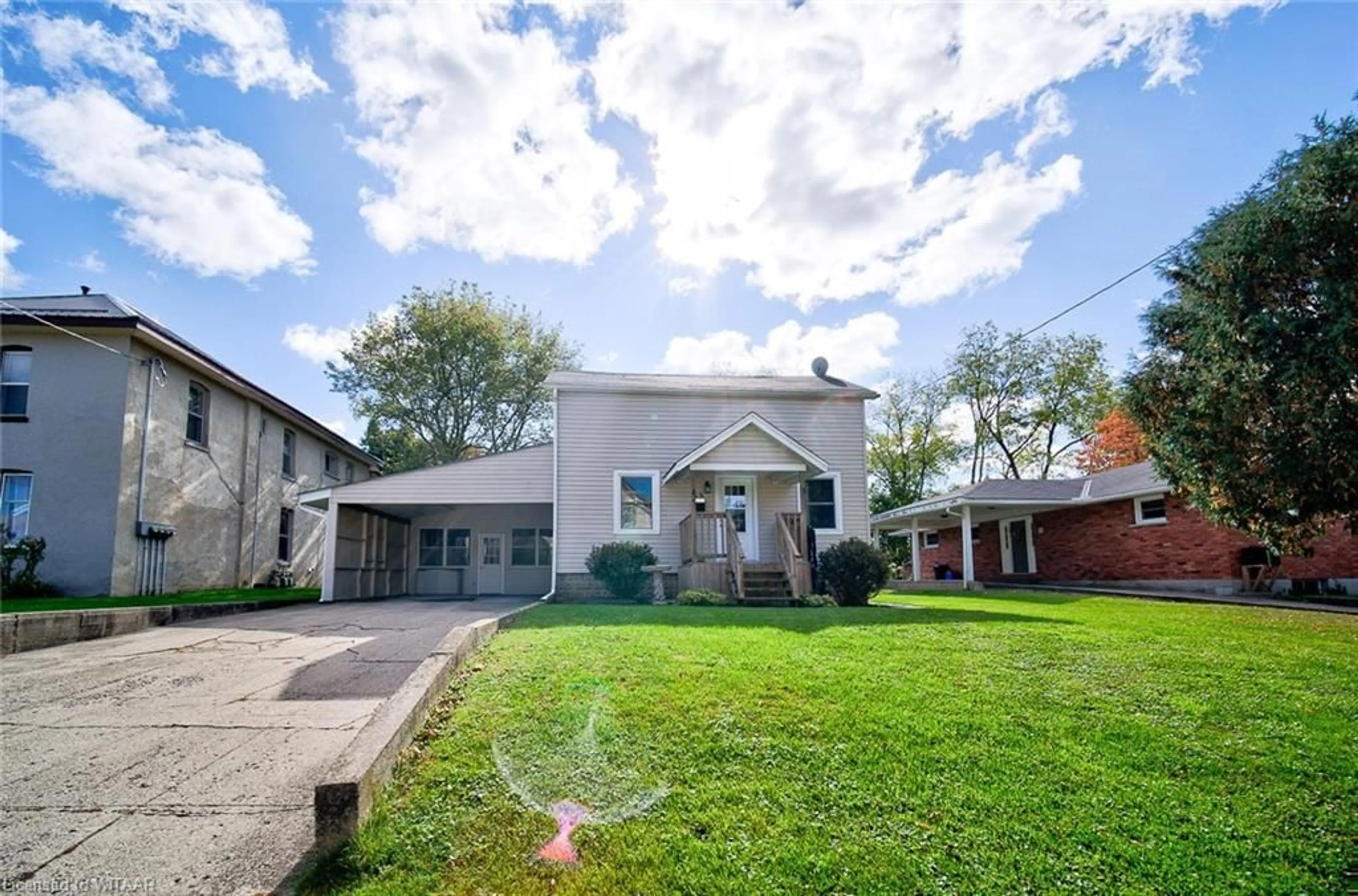 A pic from exterior of the house or condo, the fenced backyard for 63 Baldwin St, Tillsonburg Ontario N4G 2K4