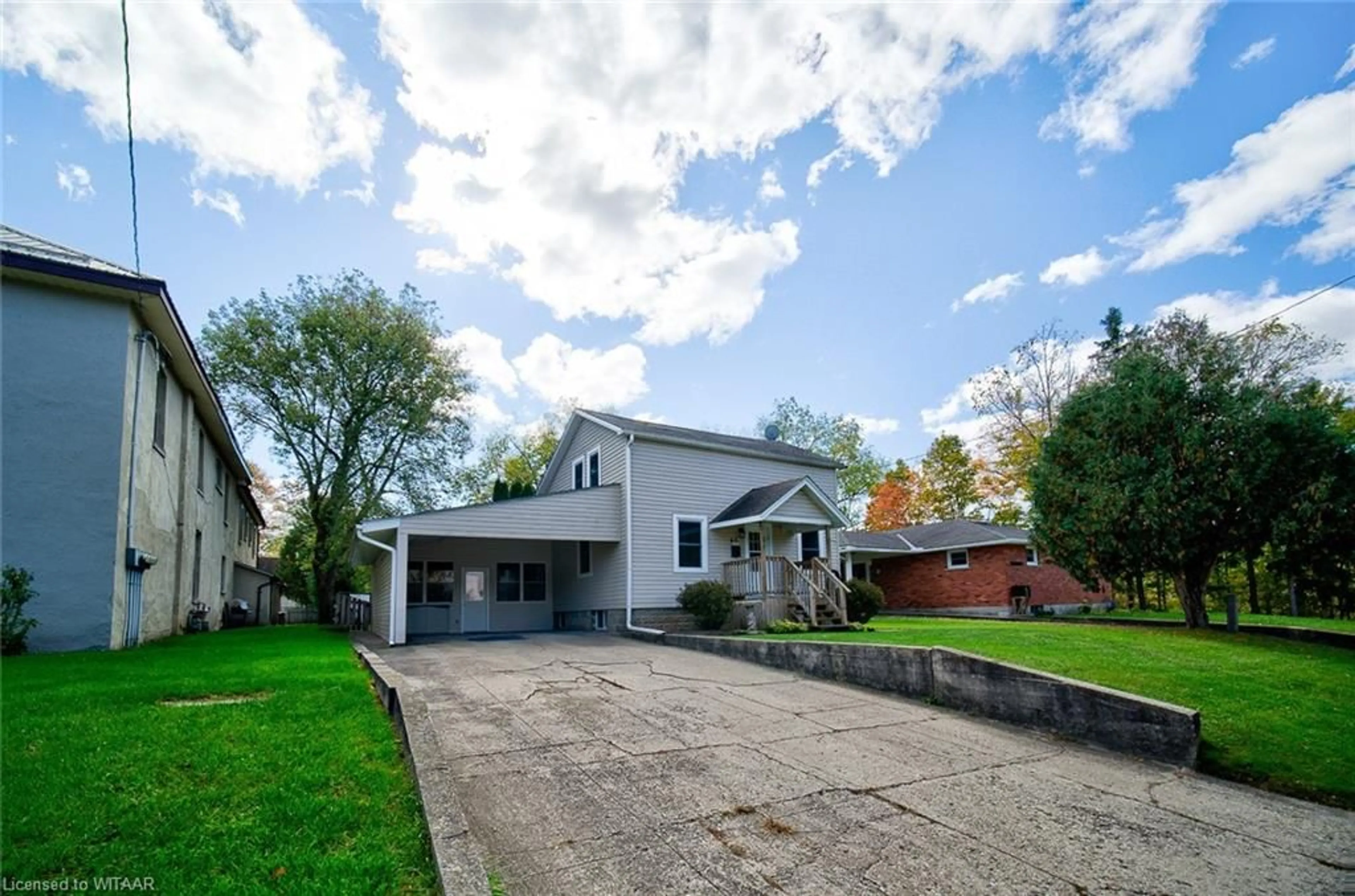 Frontside or backside of a home, the street view for 63 Baldwin St, Tillsonburg Ontario N4G 2K4