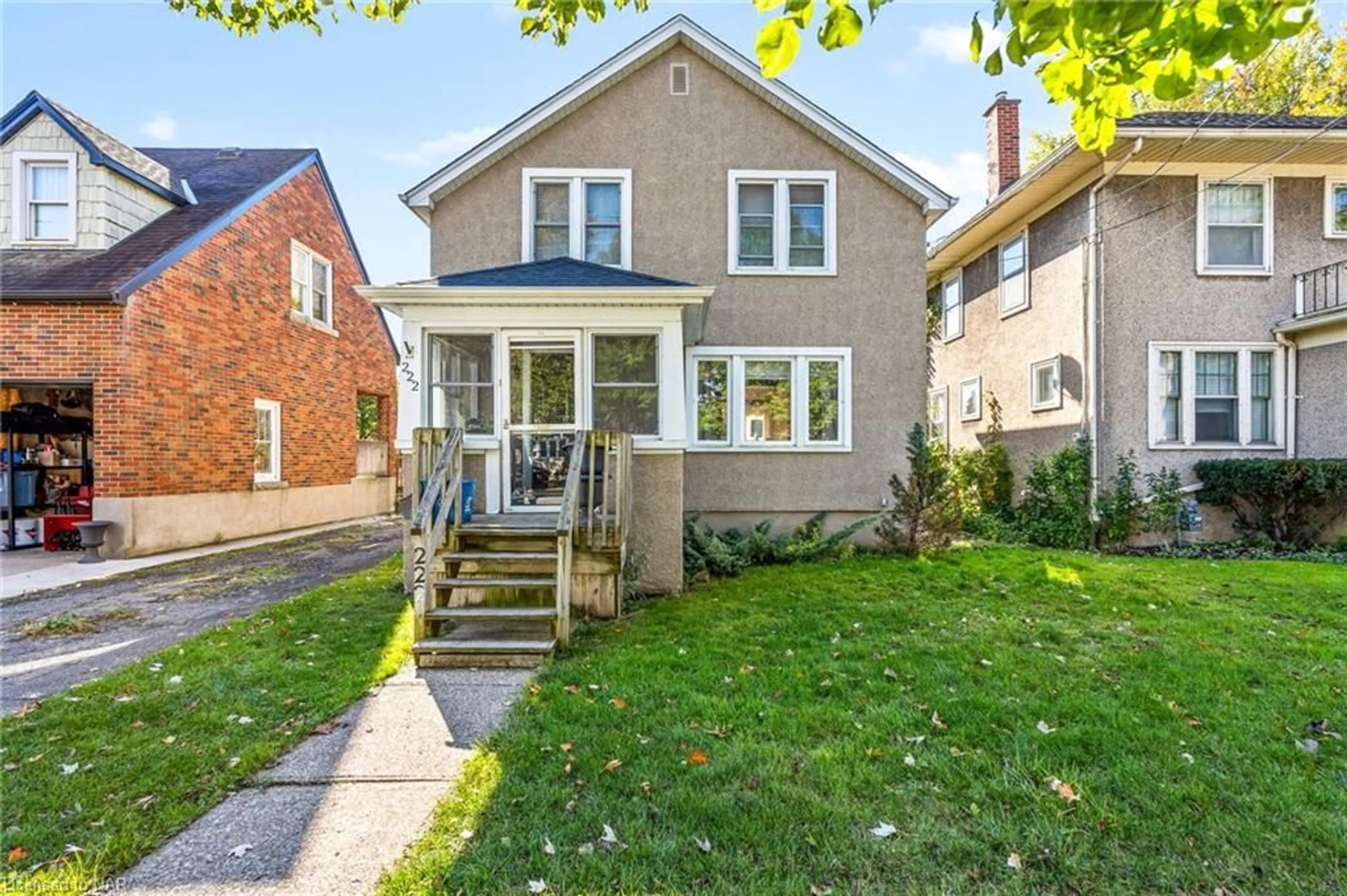 Frontside or backside of a home, the fenced backyard for 222 Alexandra St, Port Colborne Ontario L3K 2Y8