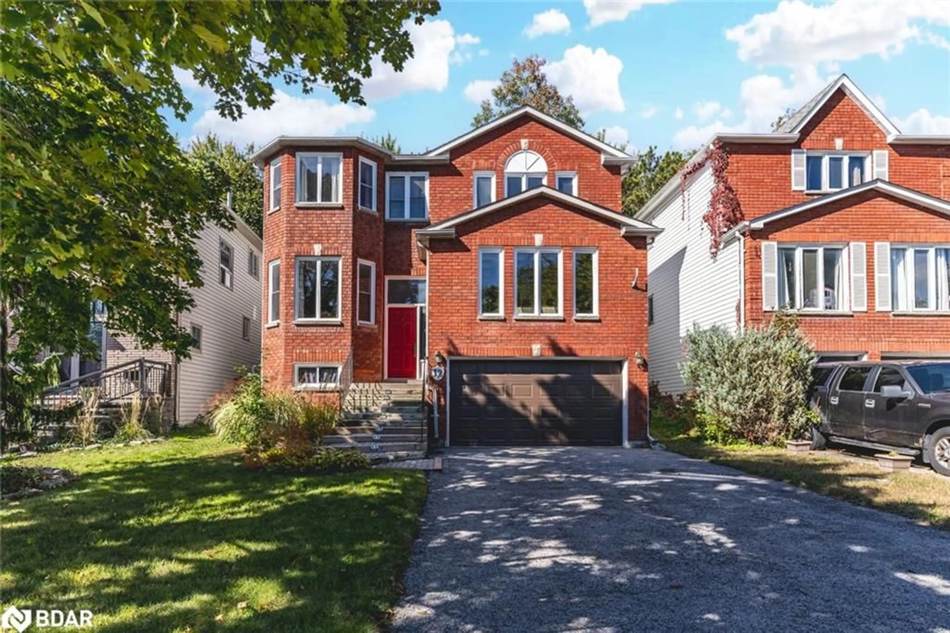 Frontside or backside of a home, the street view for 12 Moore Pl, Barrie Ontario L4N 6N6