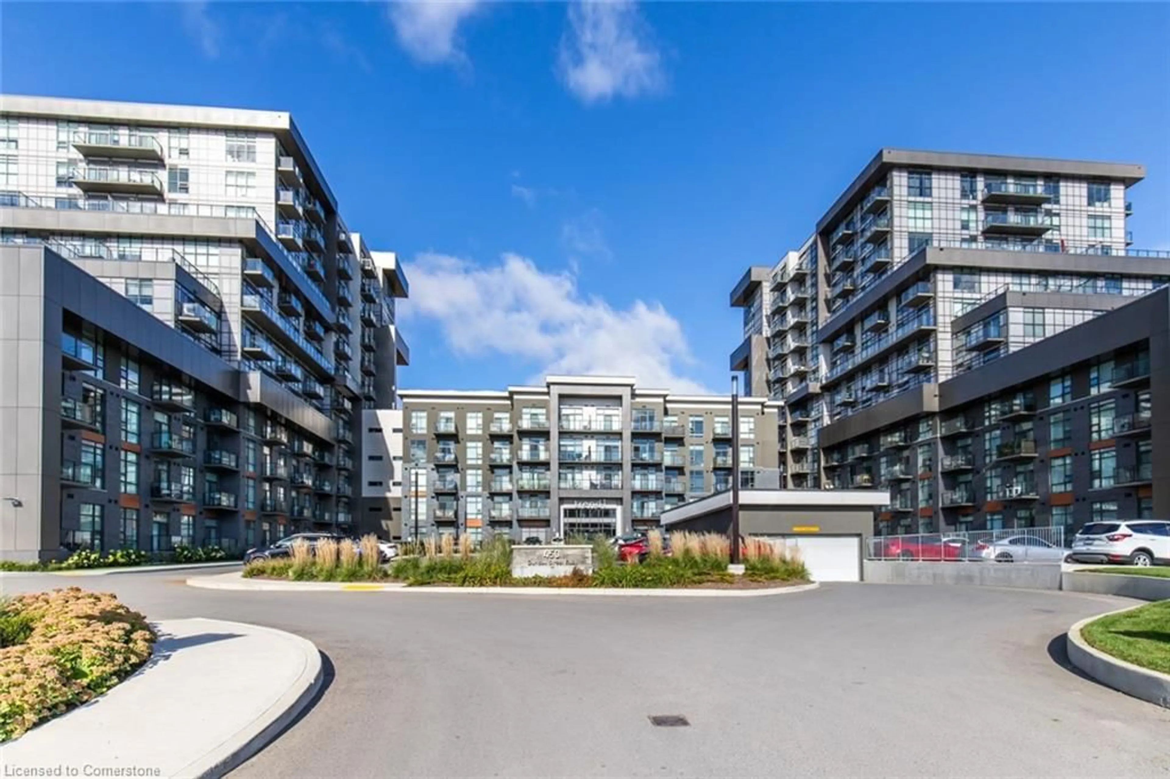 A pic from exterior of the house or condo, the front or back of building for 450 Dundas St #407, Waterdown Ontario L8B 1Z2